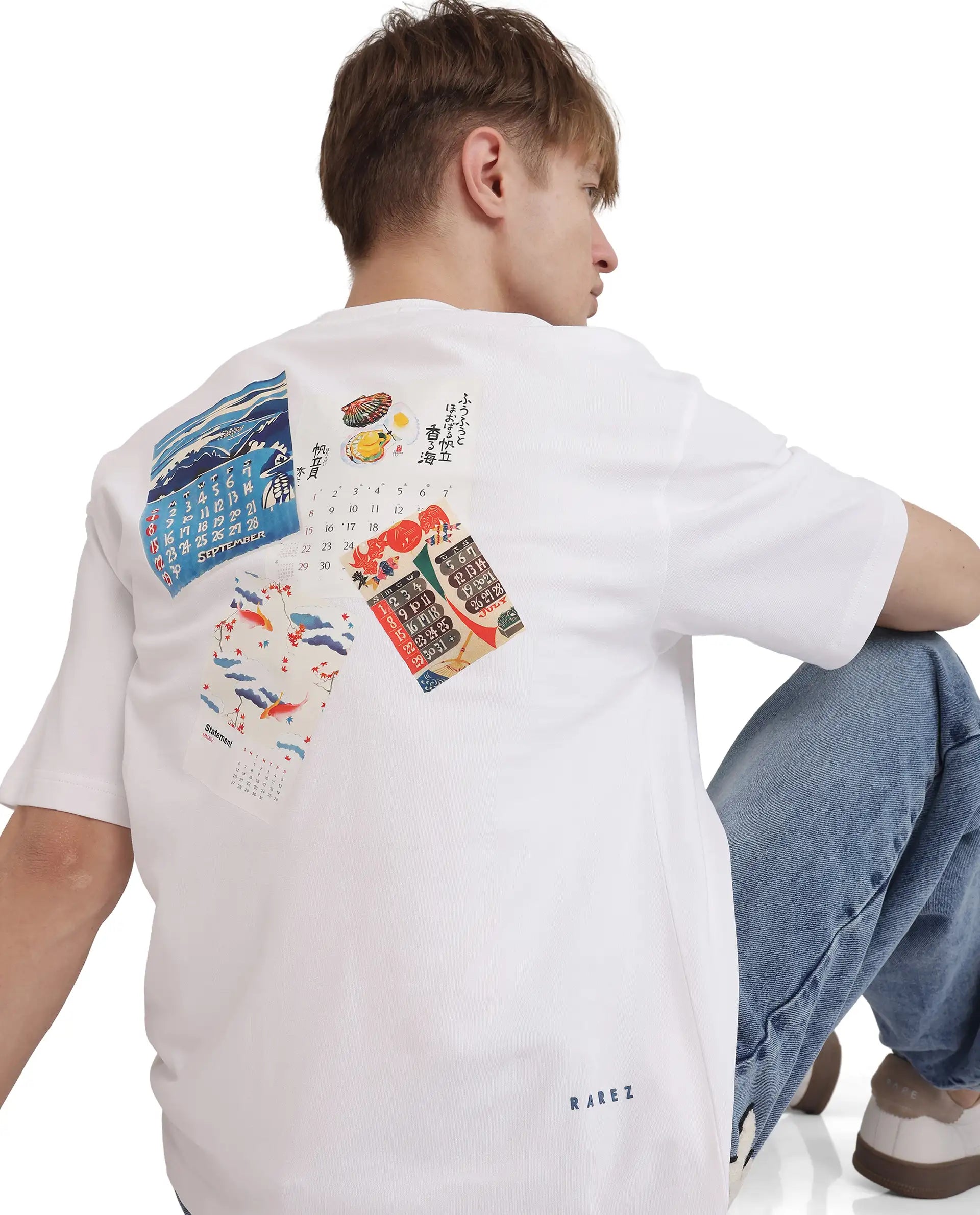 Rare Rabbit Men Voy White Cotton Fabric Short Sleeve Crew Neck Slip-On Oversized Fit Graphic Print T-Shirt