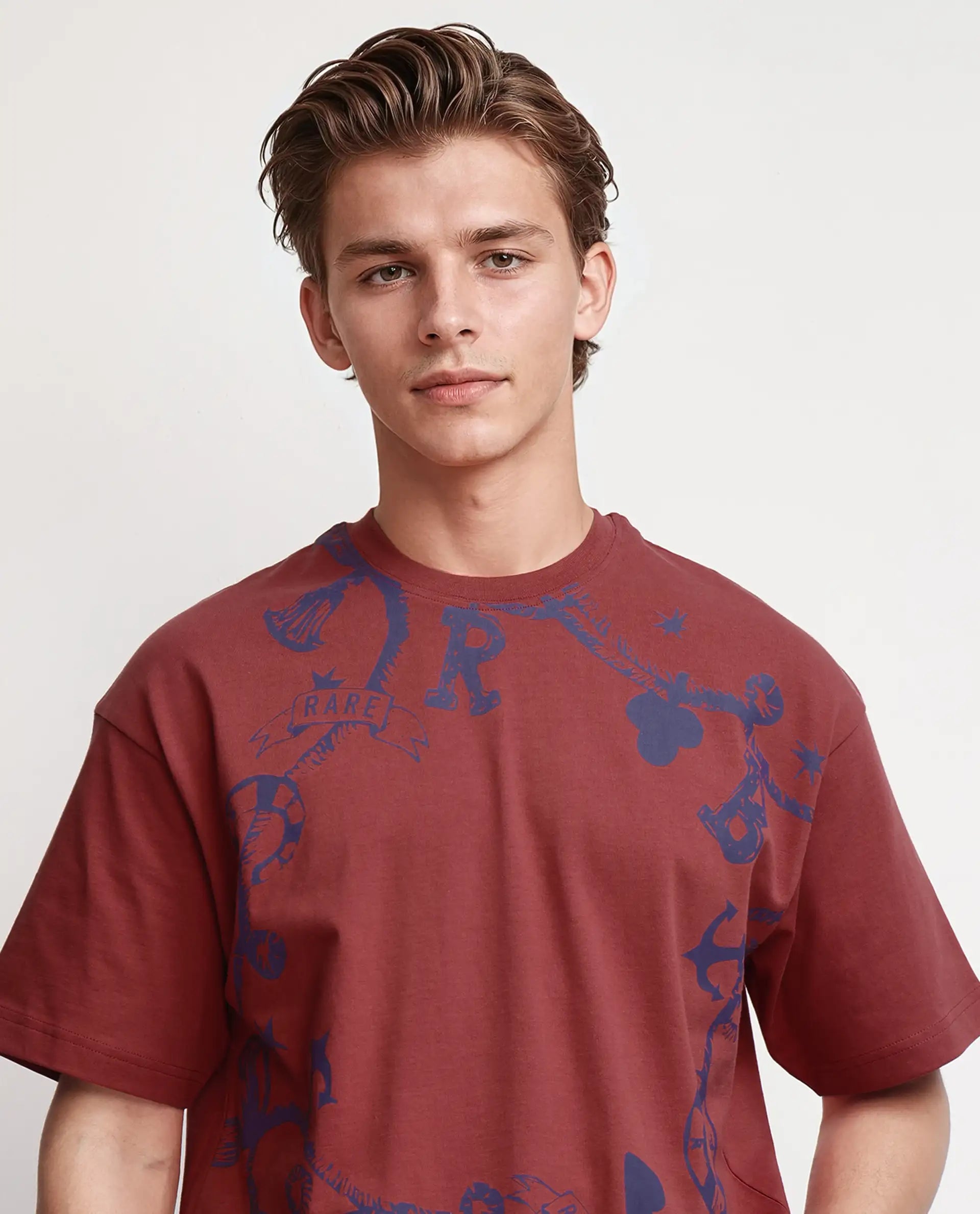 Rare Rabbit Men Xab Pastel Red Cotton Fabric Short Sleeve Crew Neck Oversized Fit Graphic Print T-Shirt