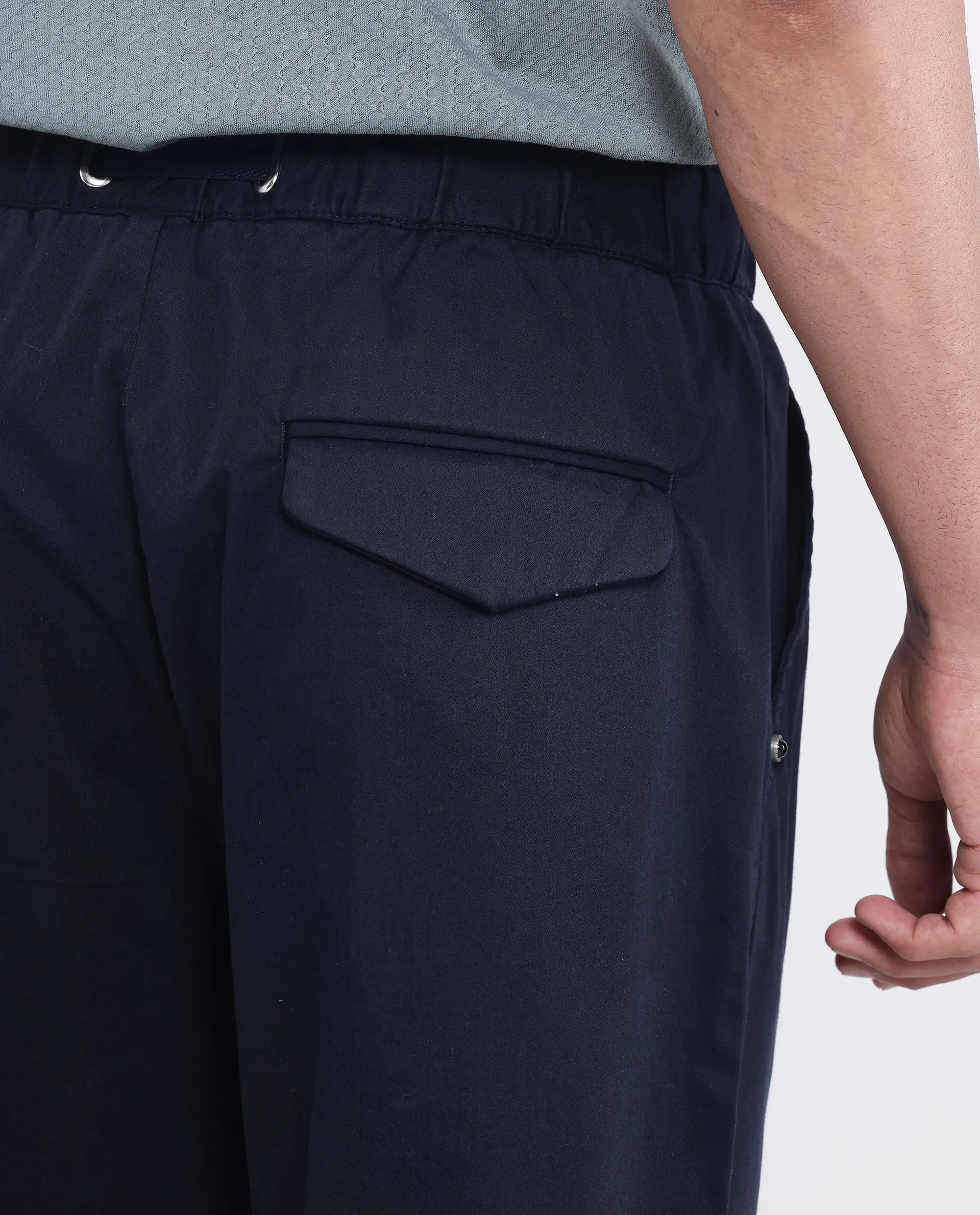 Rare Rabbit Men Yocko Navy Cotton Elastane Fabric Baggy Fit Pleated Plain Trouser