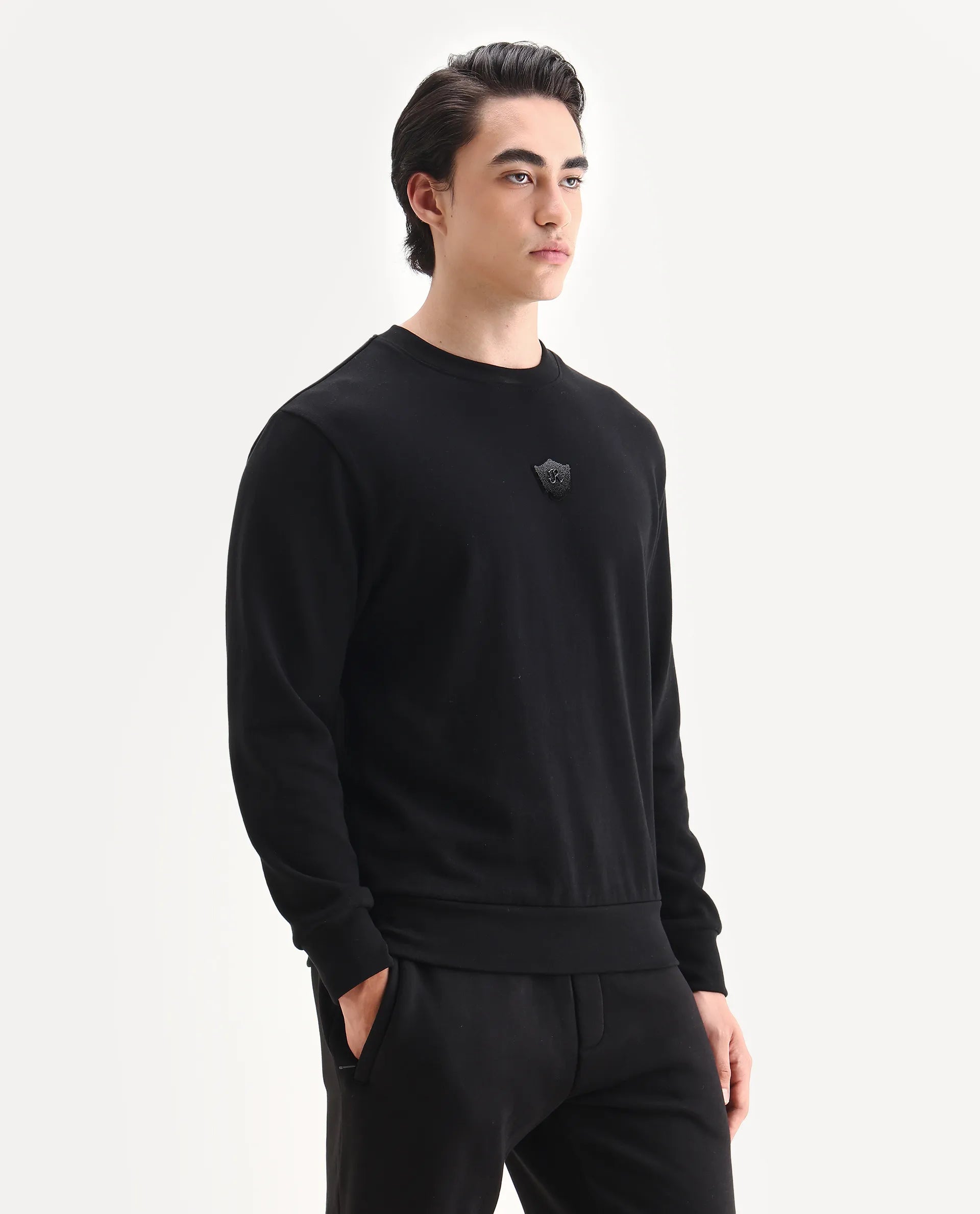 Rare Rabbit Men's Agon Black Rayon Blend Fabric Full Sleeves Crew Neck Badge Print Sweatshirt
