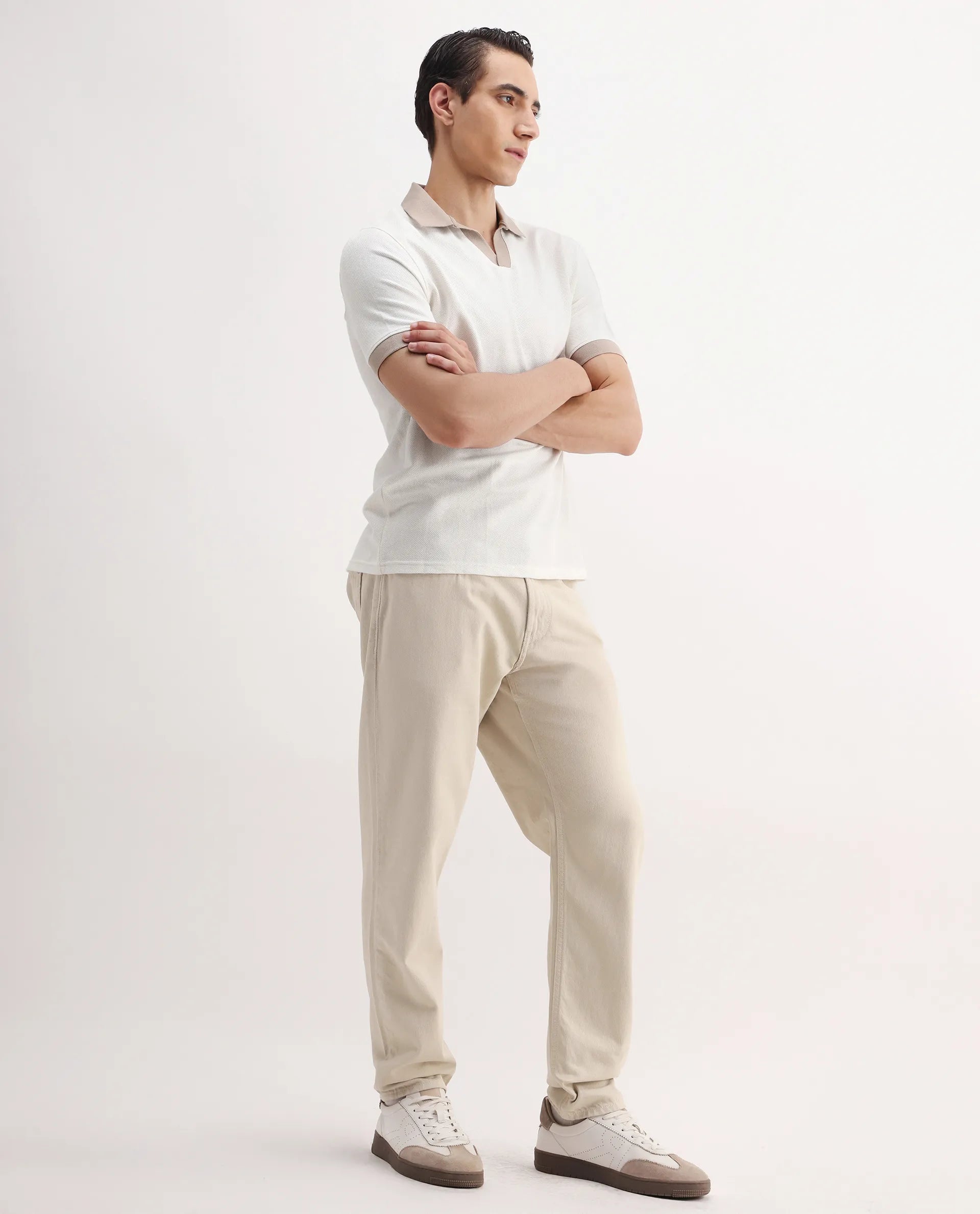 Rare Rabbit Men's Arvi-2 Light Beige Cotton Blend Plain Dond Carrot Fit Jeans