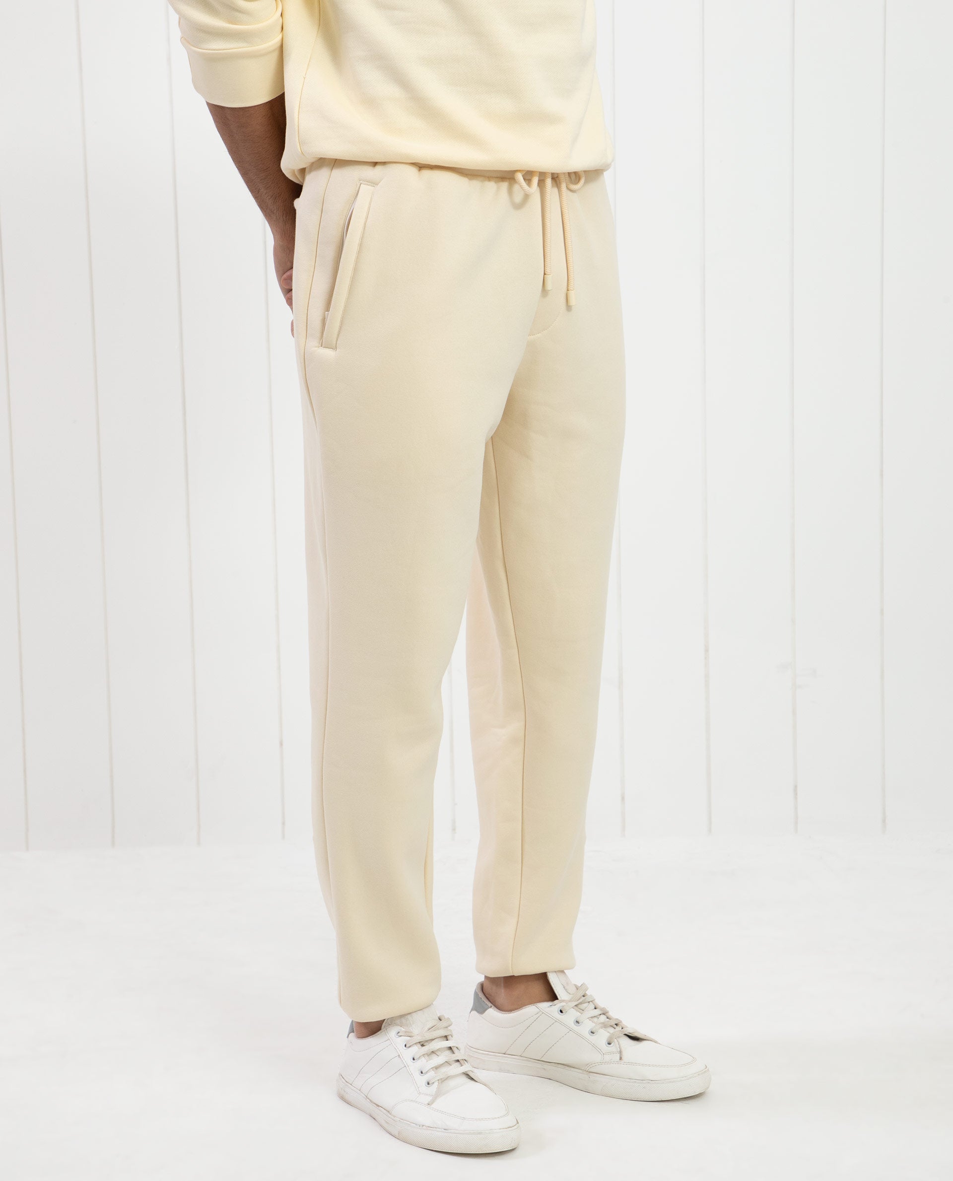 Rare Rabbit Mens Bard Light Yellow Cotton Polyester Fabric Drawstring Closure Regular Fit Mid Rise Trackpant