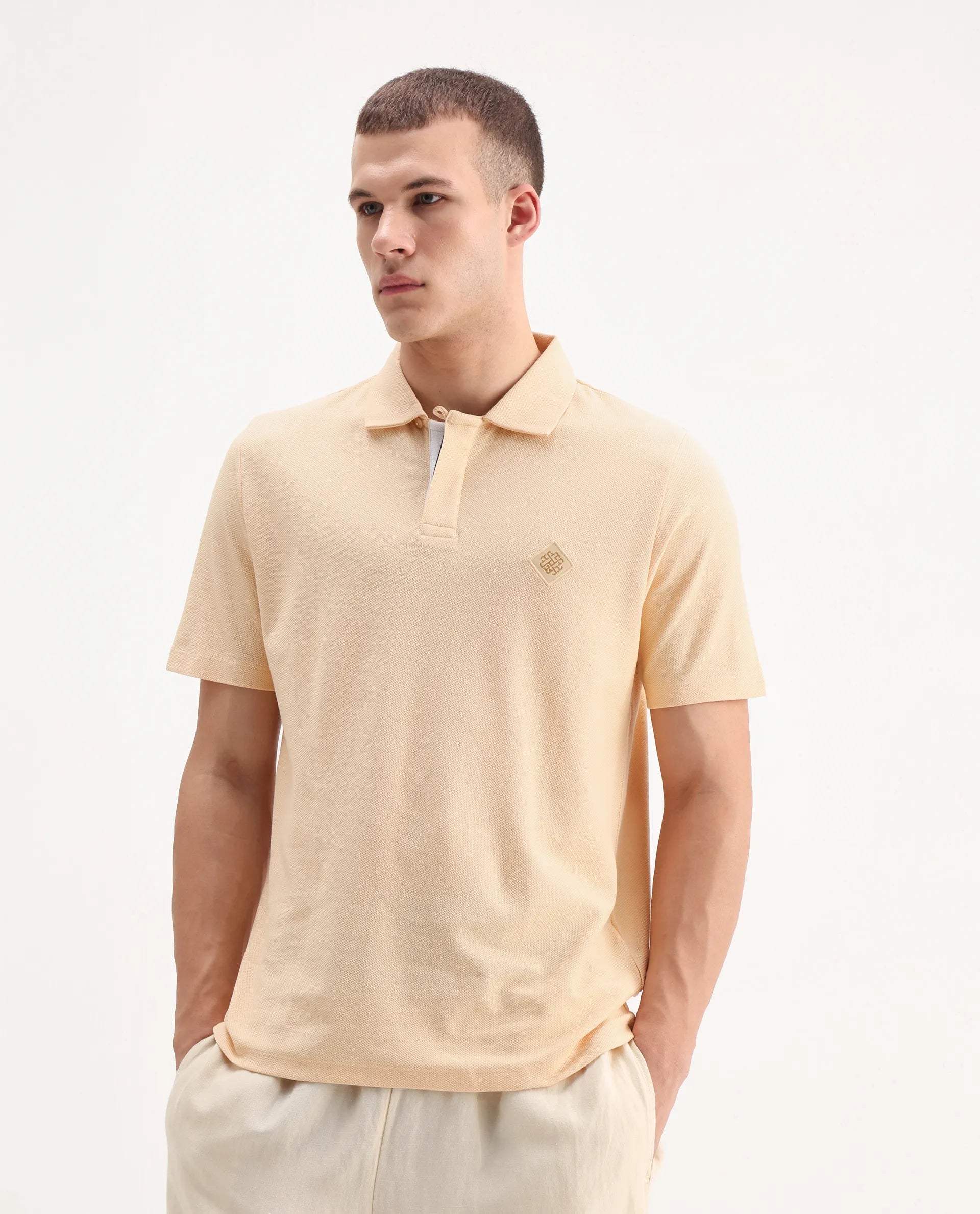 Rare Rabbit Men's Charles Light Yellow Cotton Plain Regular Fit Half Sleeve Polo