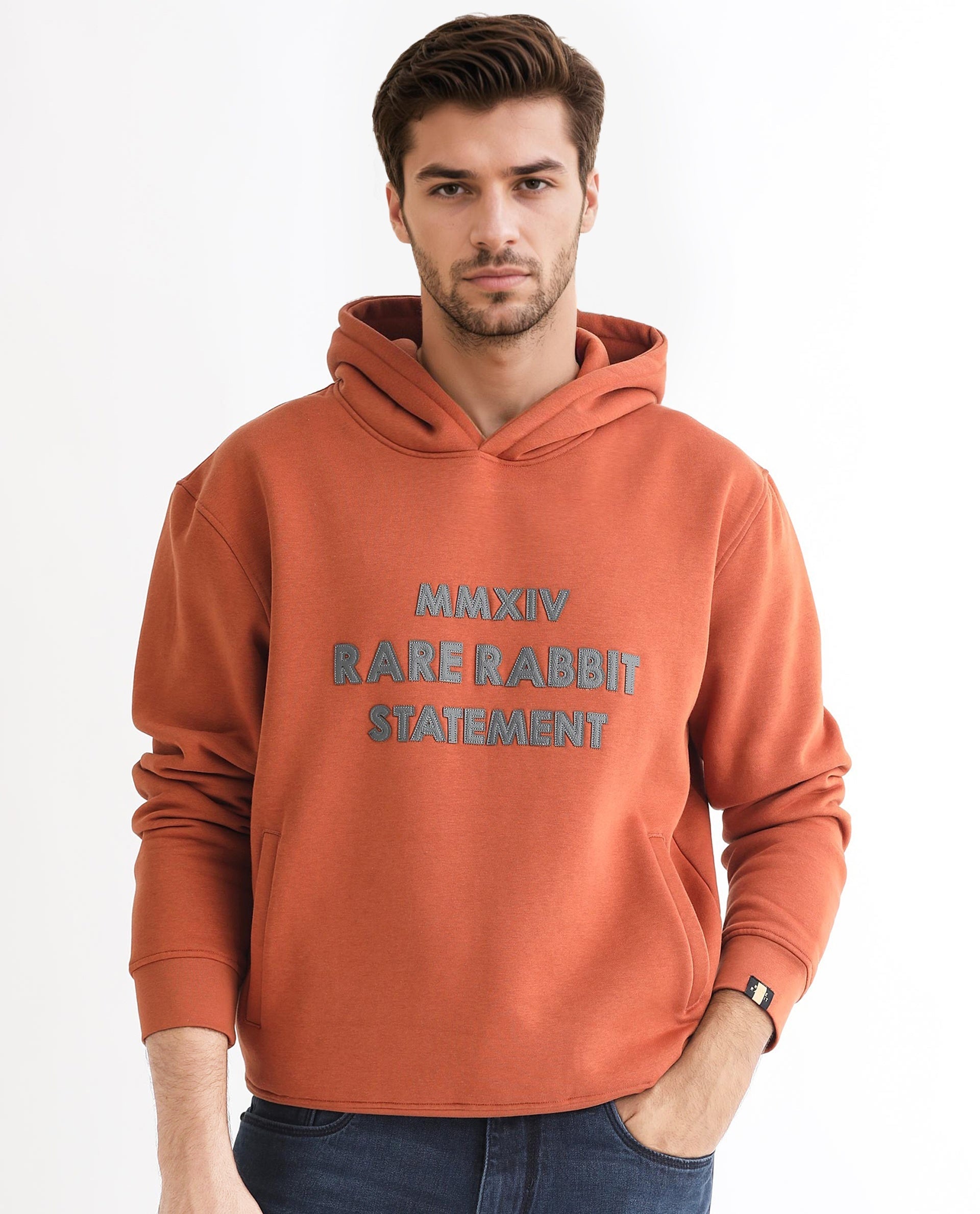 Rare Rabbit Men's Ether Rust Cotton Polyester Fabric Neck Full Sleeves Leather Appliqué Knitted Hooded Sweatshirt