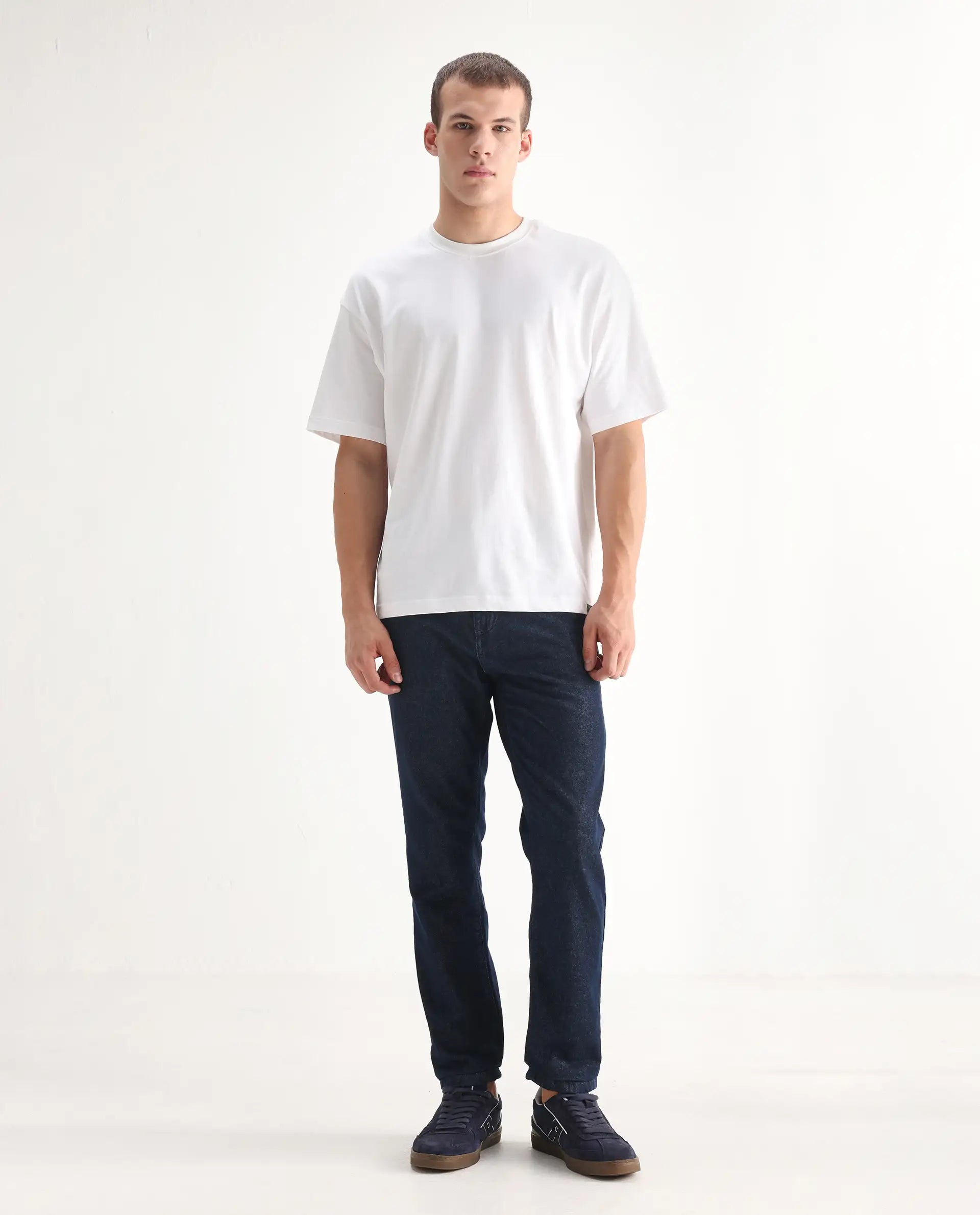 Rare Rabbit Men's Gleb Dark Blue Cotton Plain Kurt Carrot Fit Jeans