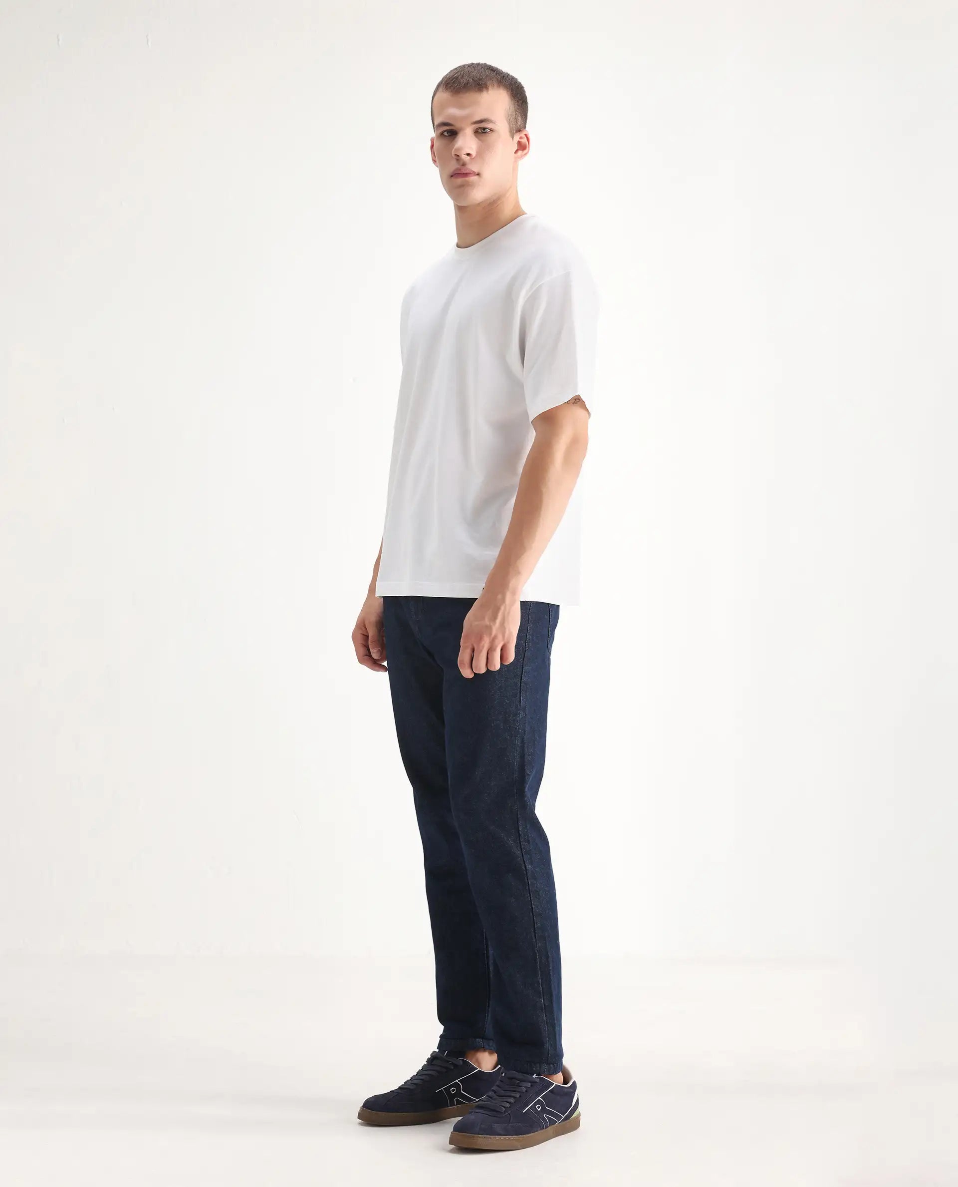 Rare Rabbit Men's Gleb Dark Blue Cotton Plain Kurt Carrot Fit Jeans