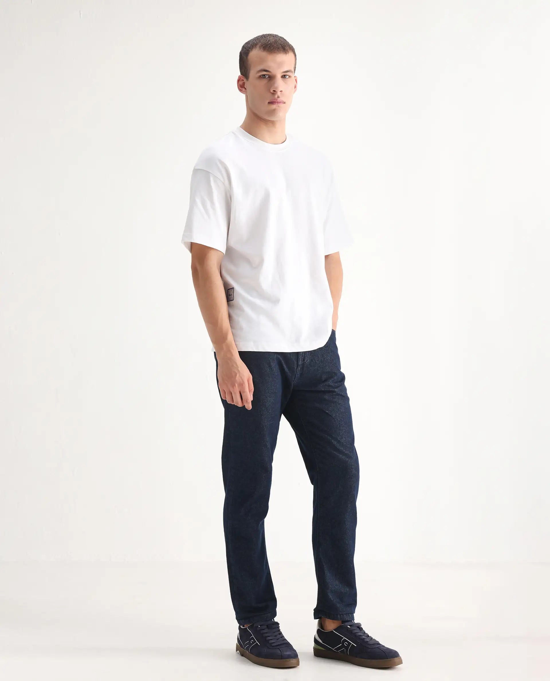Rare Rabbit Men's Gleb Dark Blue Cotton Plain Kurt Carrot Fit Jeans
