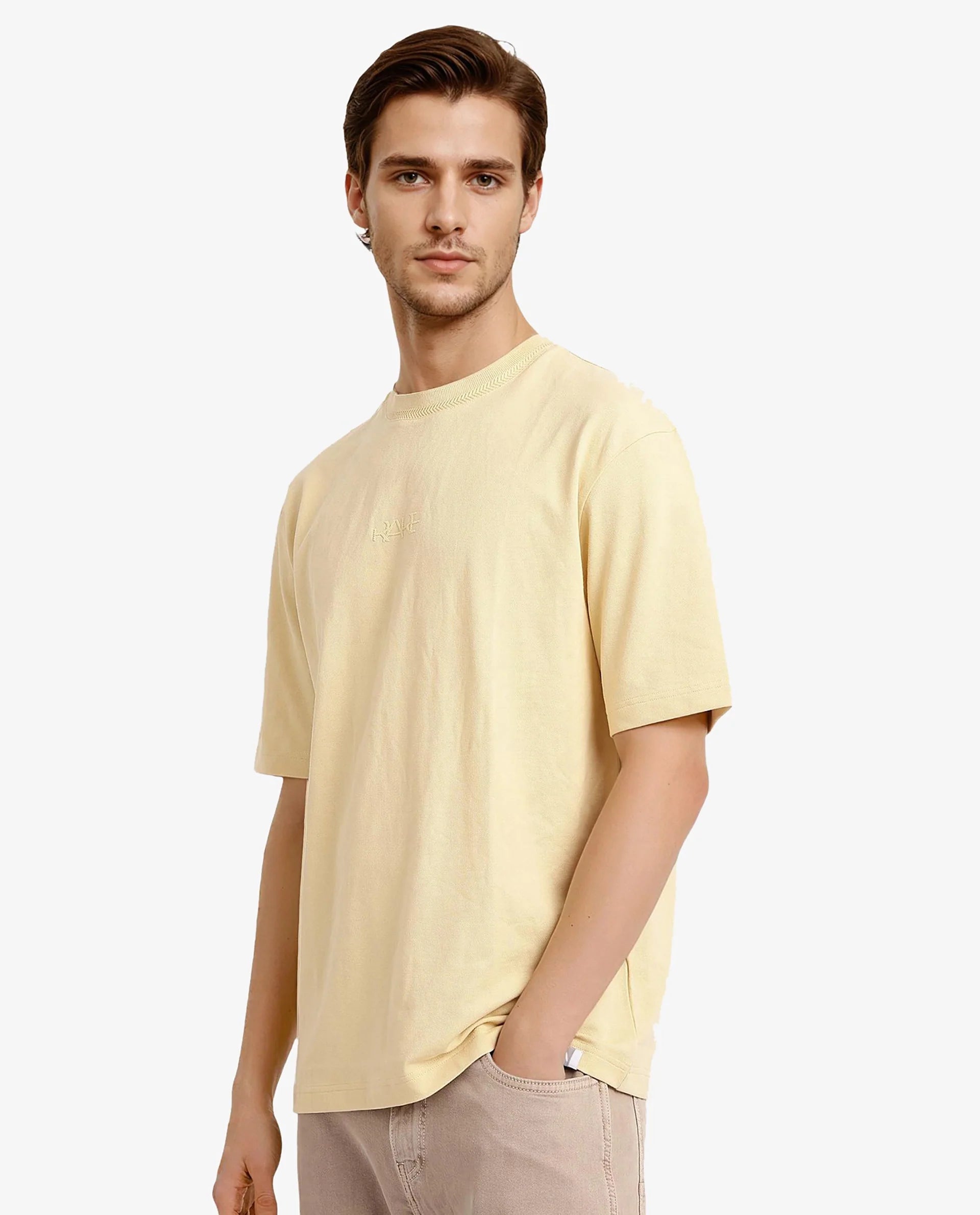 Rare Rabbit Mens Heros-1 Light Yellow Cotton Lycra Fabric Blend Drop Shoulder Short Sleeve Oversized Fit Solid T-Shirt
