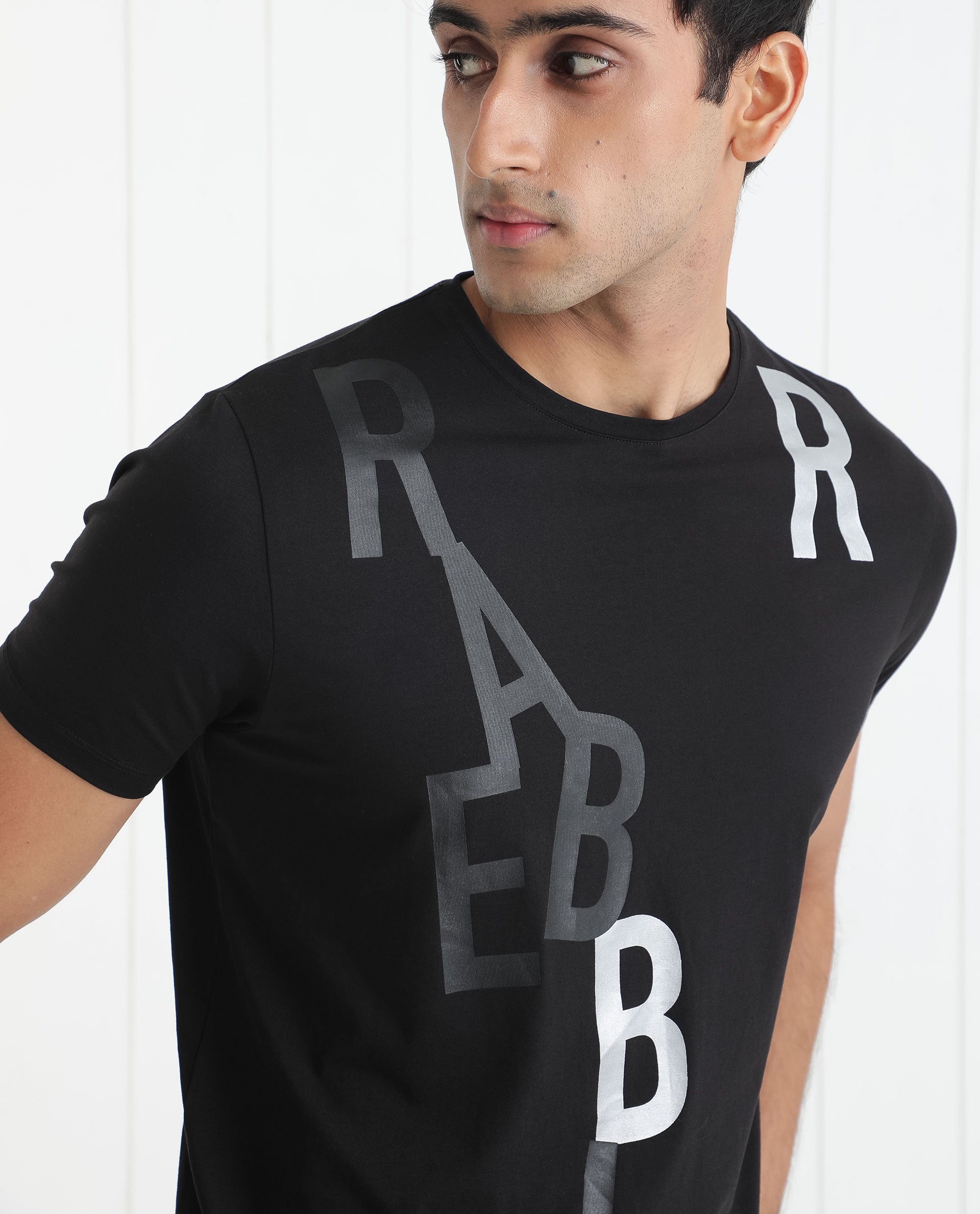 Rare Rabbit Men's Heras Black Crew Neck Foil and Plastisol Overall Branding Half Sleeves Regular Fit T-Shirt