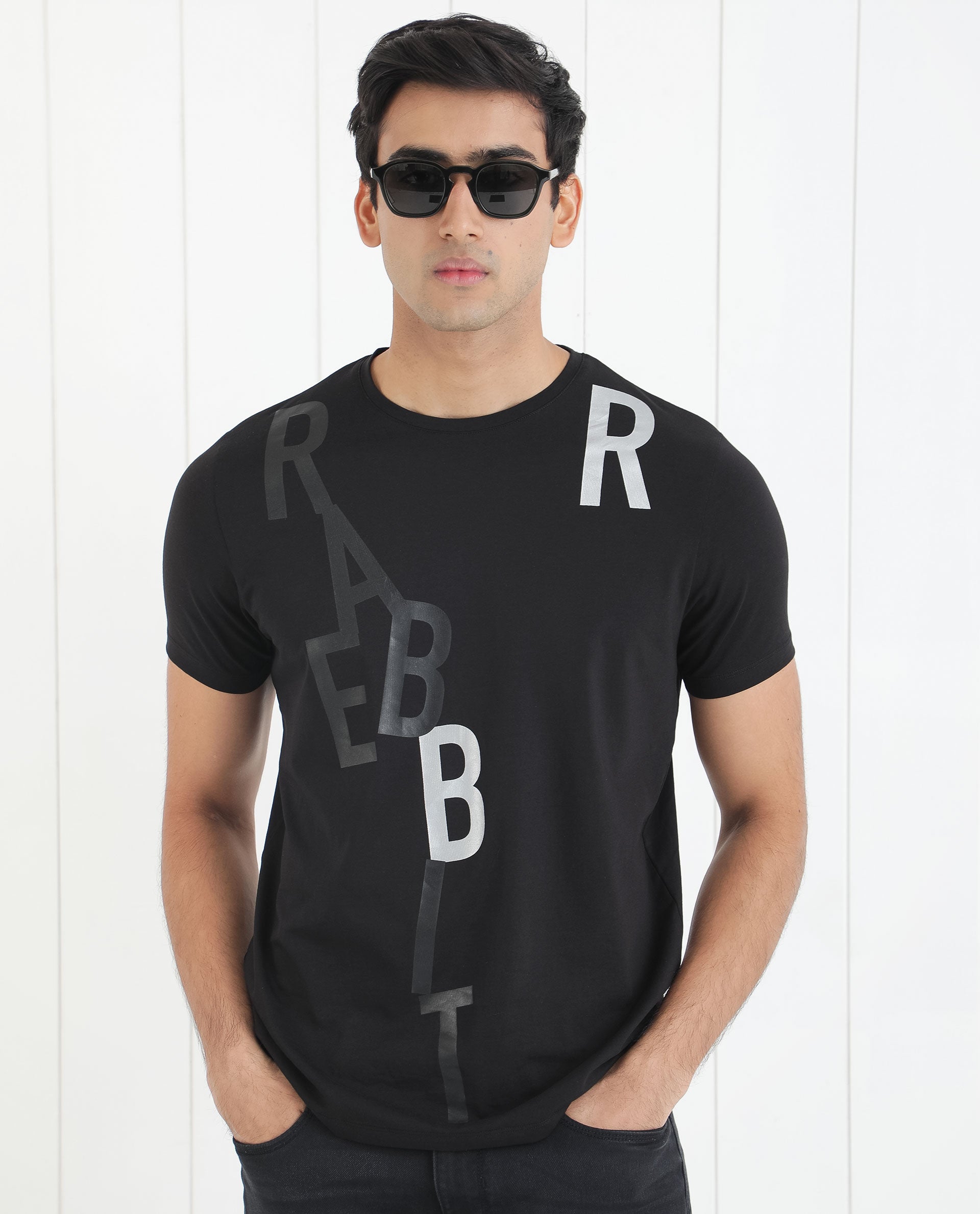 Rare Rabbit Men's Heras Black Crew Neck Foil and Plastisol Overall Branding Half Sleeves Regular Fit T-Shirt