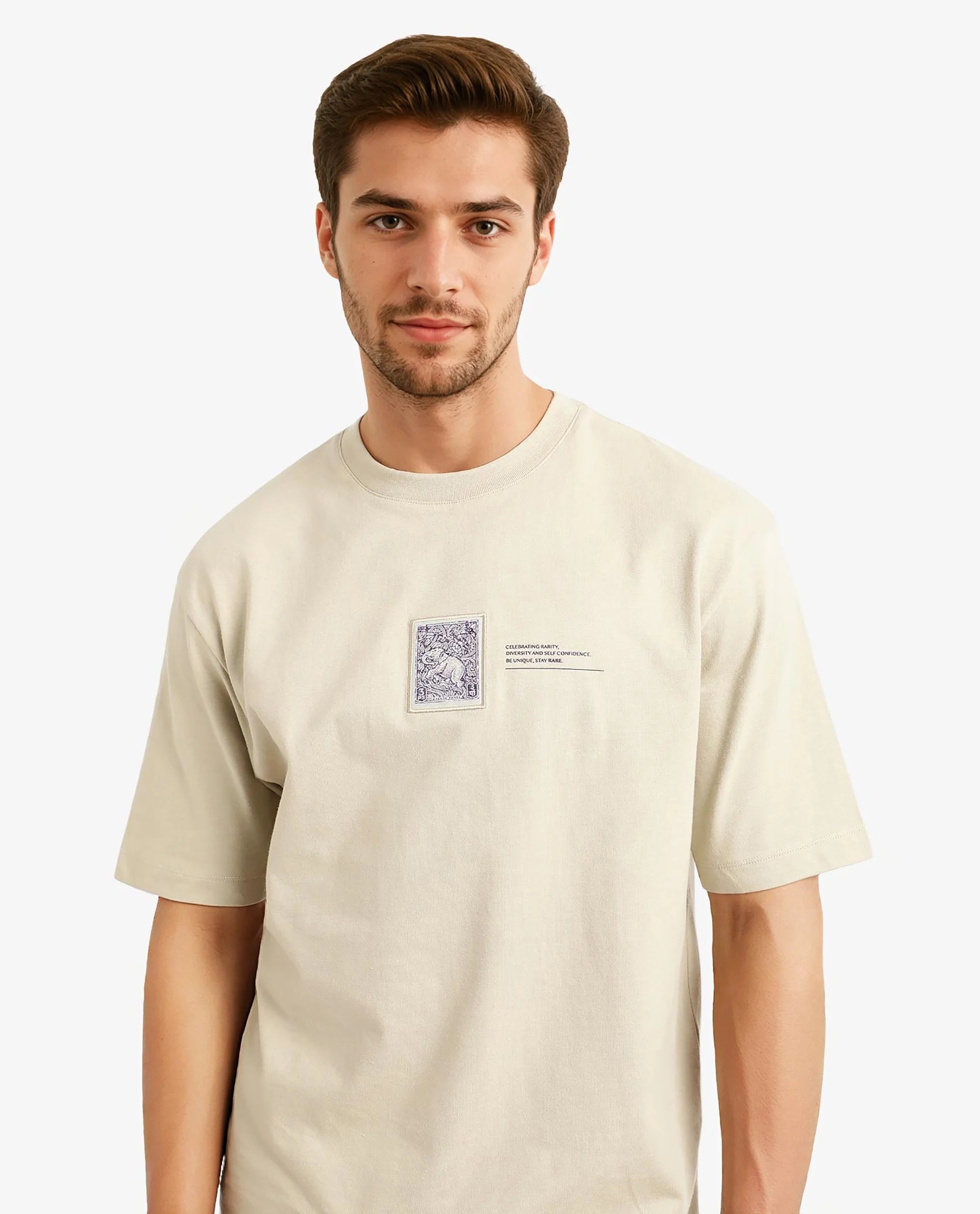 Rare Rabbit Men Iylo Beige Cotton Fabric Short Sleeve Crew Neck Oversized Fit Graphic Print T-Shirt