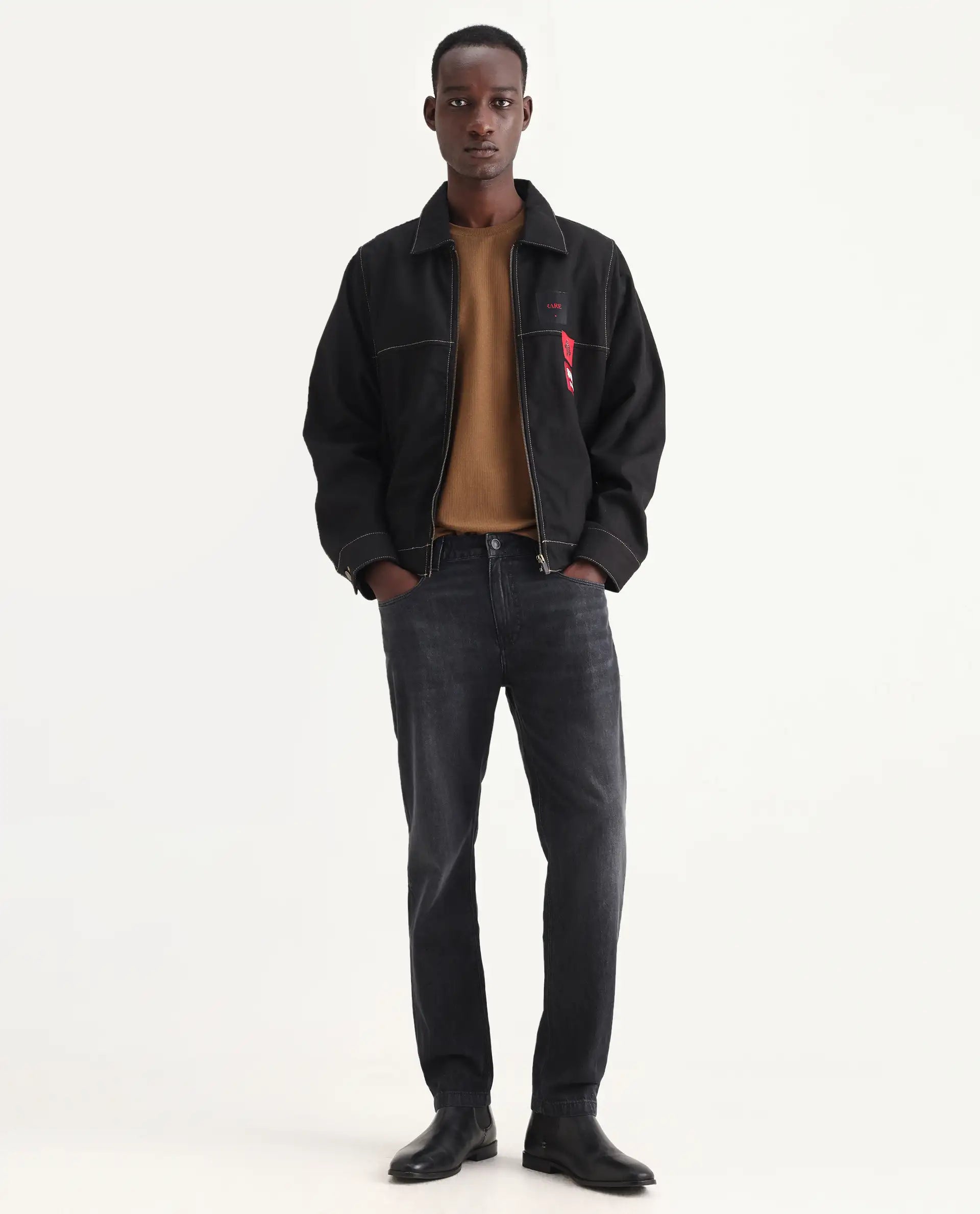 Rare Rabbit Men's Kairo-1 Black Cotton Plain Kurt Carrot Fit Jeans