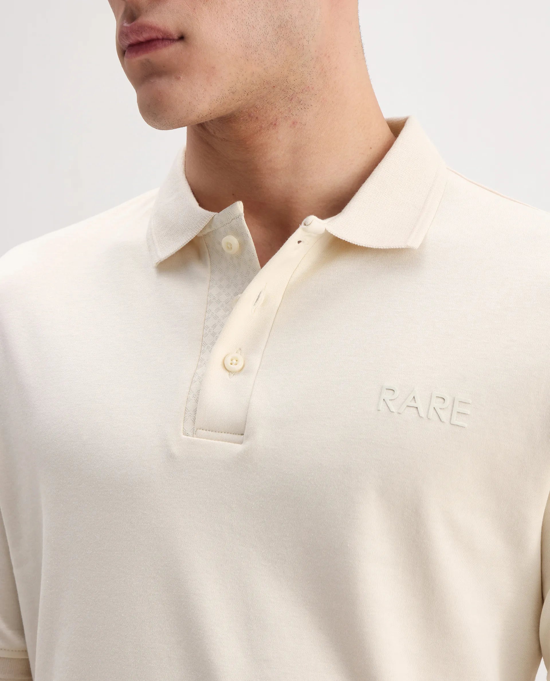 Rare Rabbit Men's Laur Off White Cotton Plain Regular Fit Half Sleeve Polo