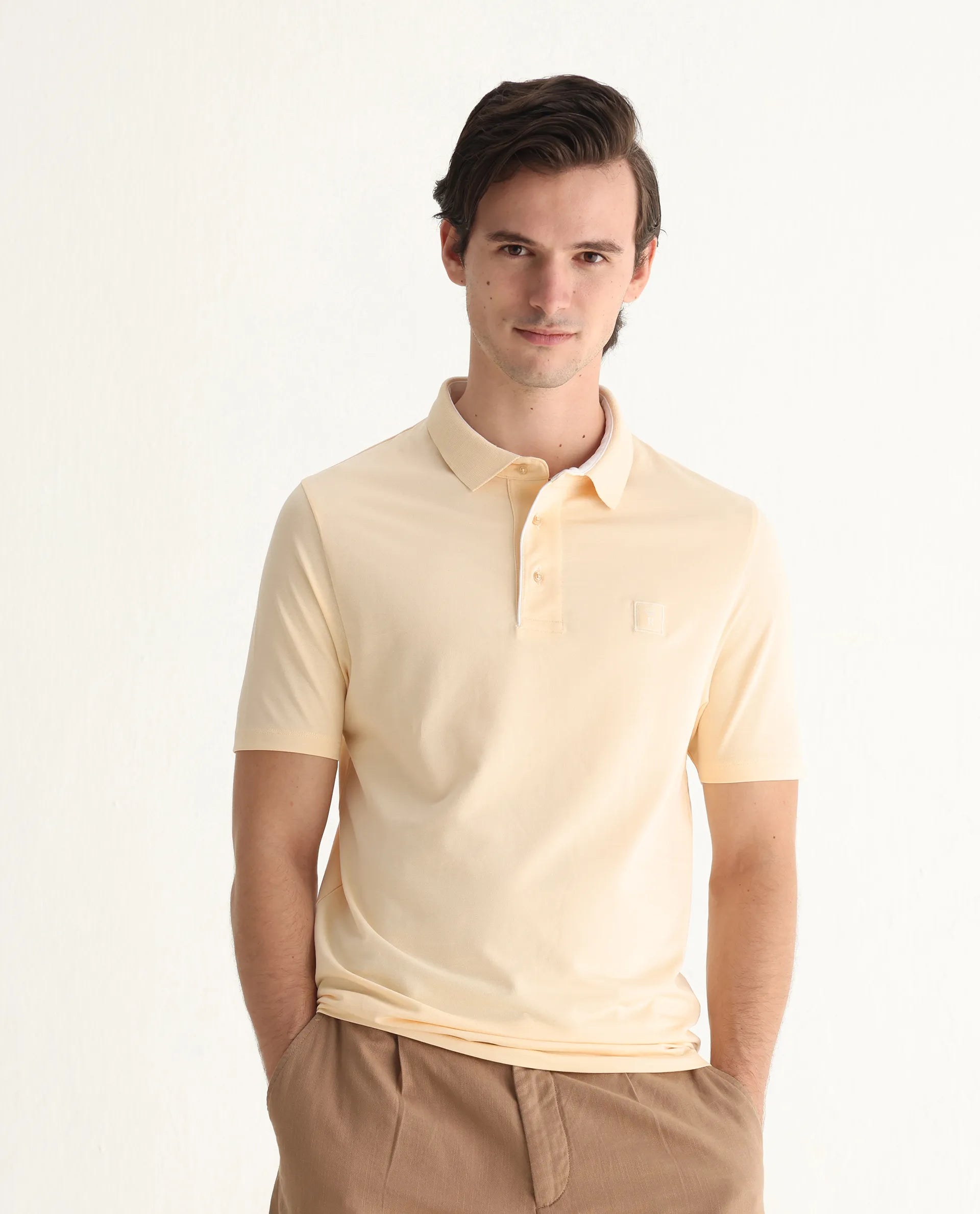 Rare Rabbit Men's Maq Pastel Yellow Cotton Plain Regular Fit Half Sleeve Polo