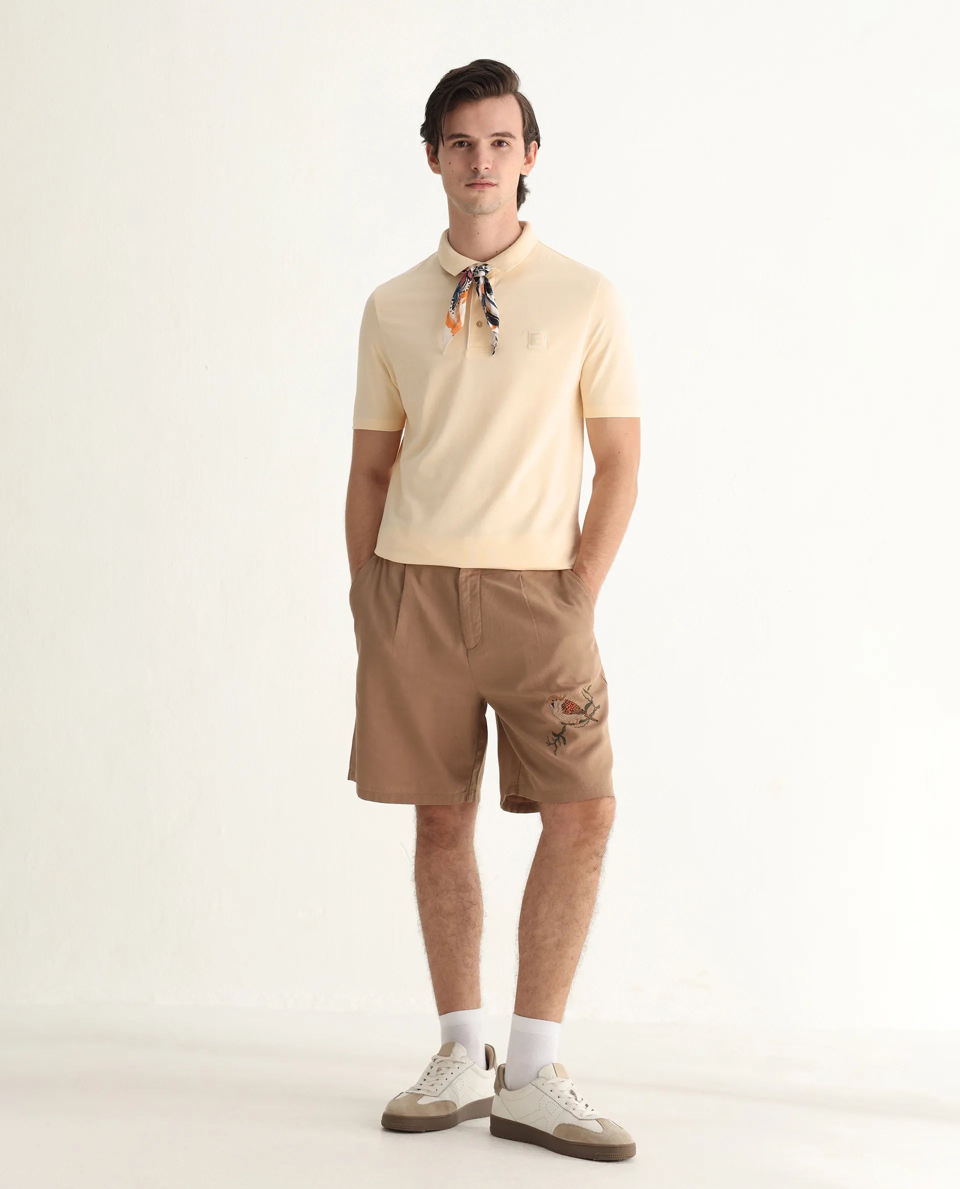 Rare Rabbit Men's Maq Pastel Yellow Cotton Plain Regular Fit Half Sleeve Polo