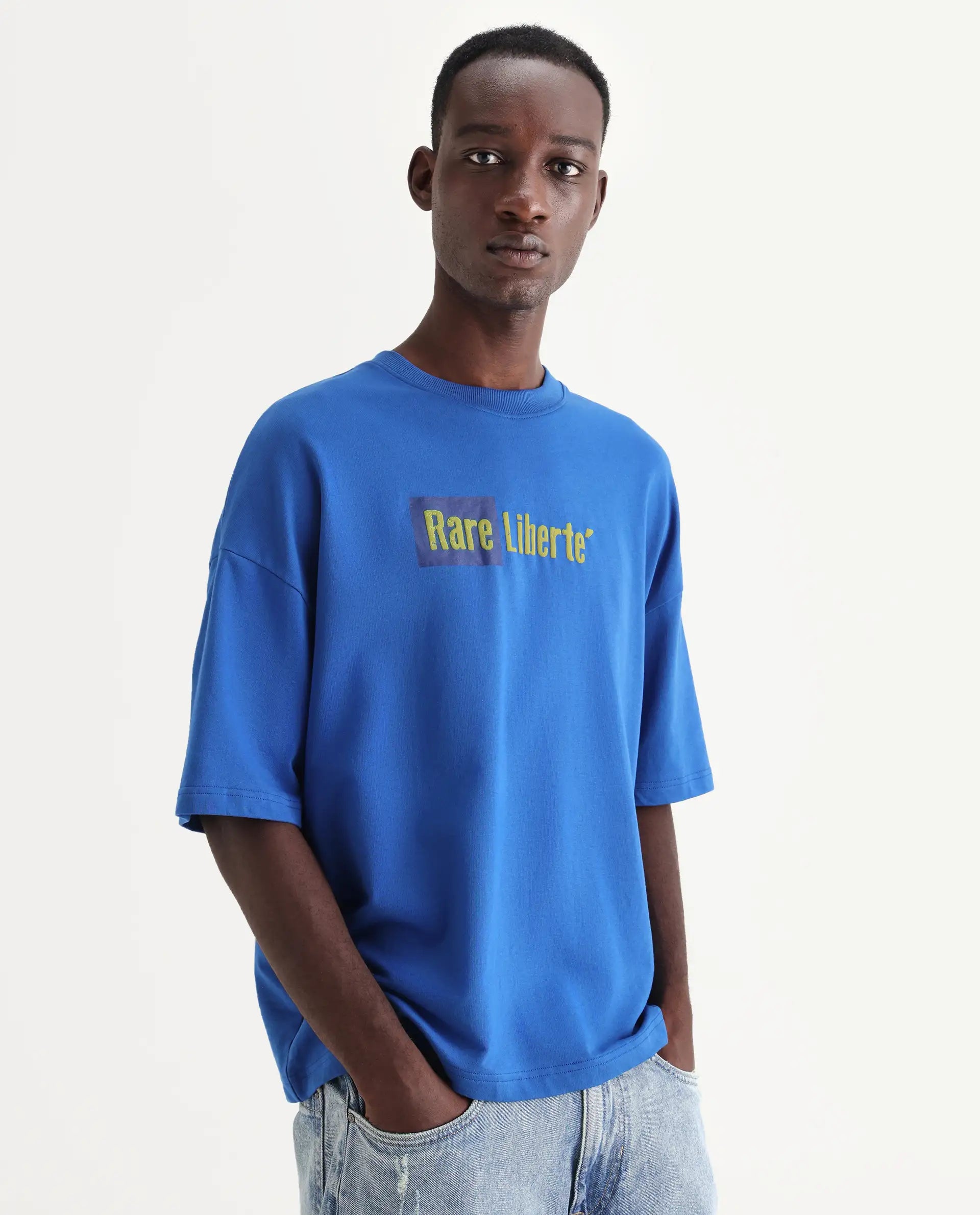 Rare Rabbit Men's Moshe Flouroscent Blue Cotton Graphic Print Oversized Fit Half Sleeve Crew Neck T-Shirt