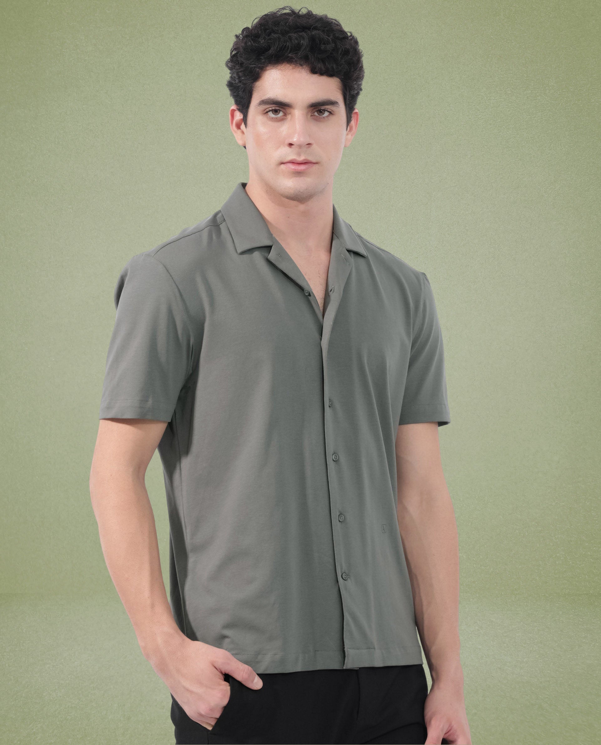 Rare Rabbit Men's Nick Dark Green Cotton Lycra Fabric Cuban Collar Half Sleeves Solid Shirt