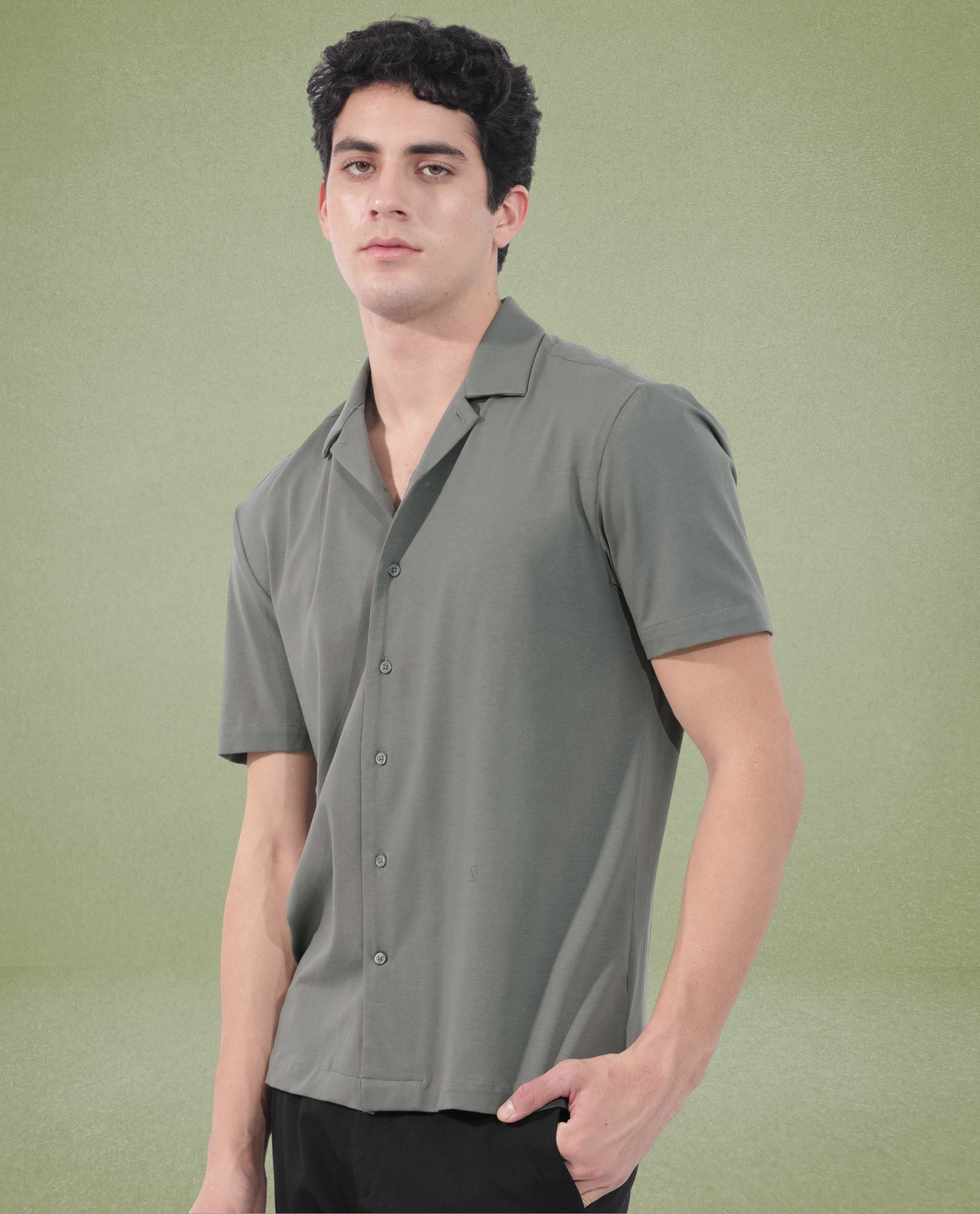Rare Rabbit Men's Nick Dark Green Cotton Lycra Fabric Cuban Collar Half Sleeves Solid Shirt