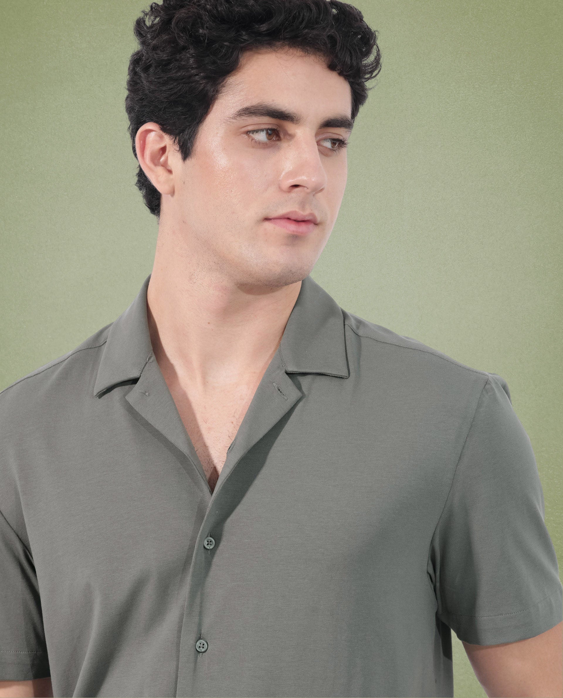 Rare Rabbit Men's Nick Dark Green Cotton Lycra Fabric Cuban Collar Half Sleeves Solid Shirt