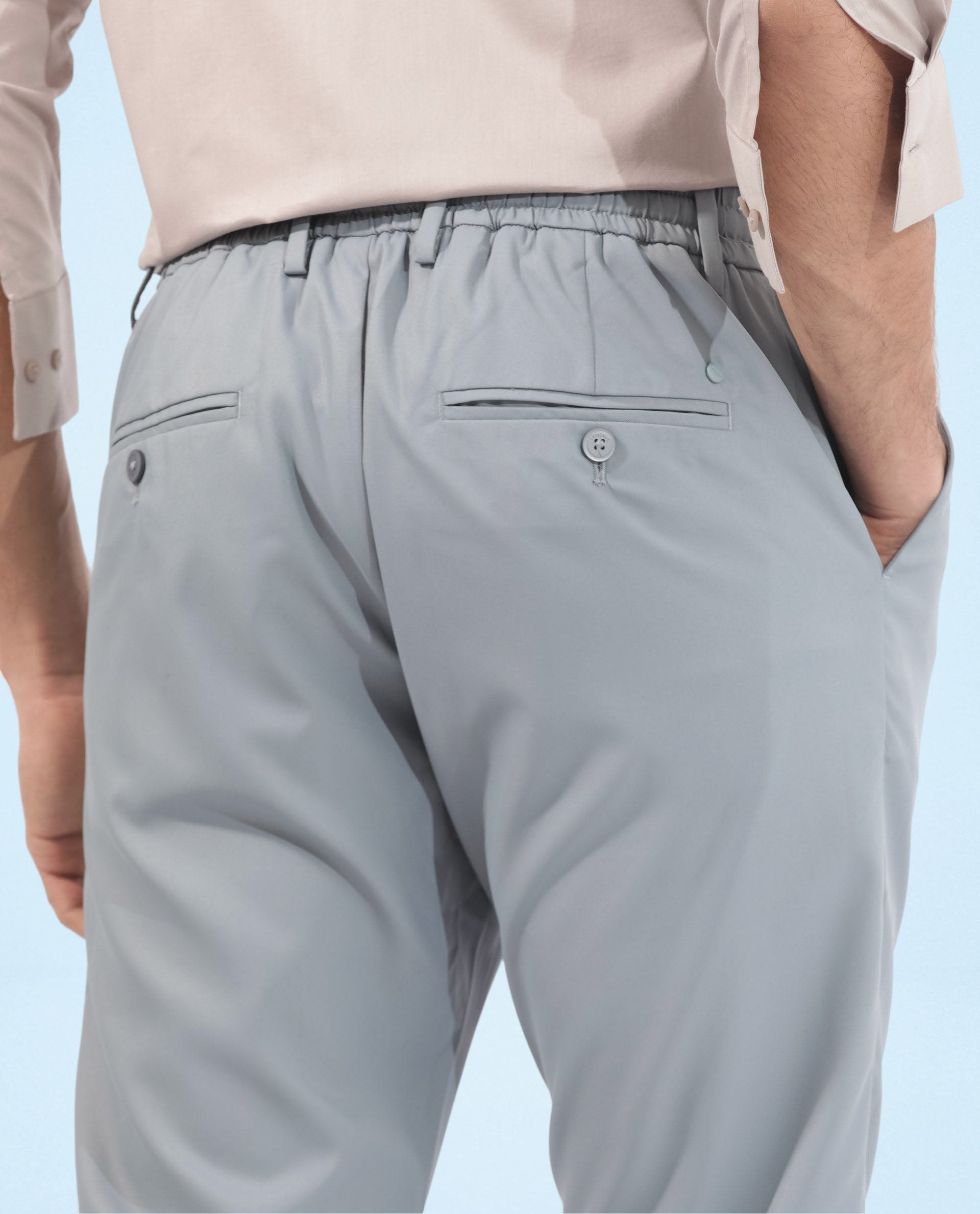 Rare Rabbit Men's Nimb Dusky Blue Polyester Fabric Drawstring And Button Closure High Rise Regular Fit Solid Trousers