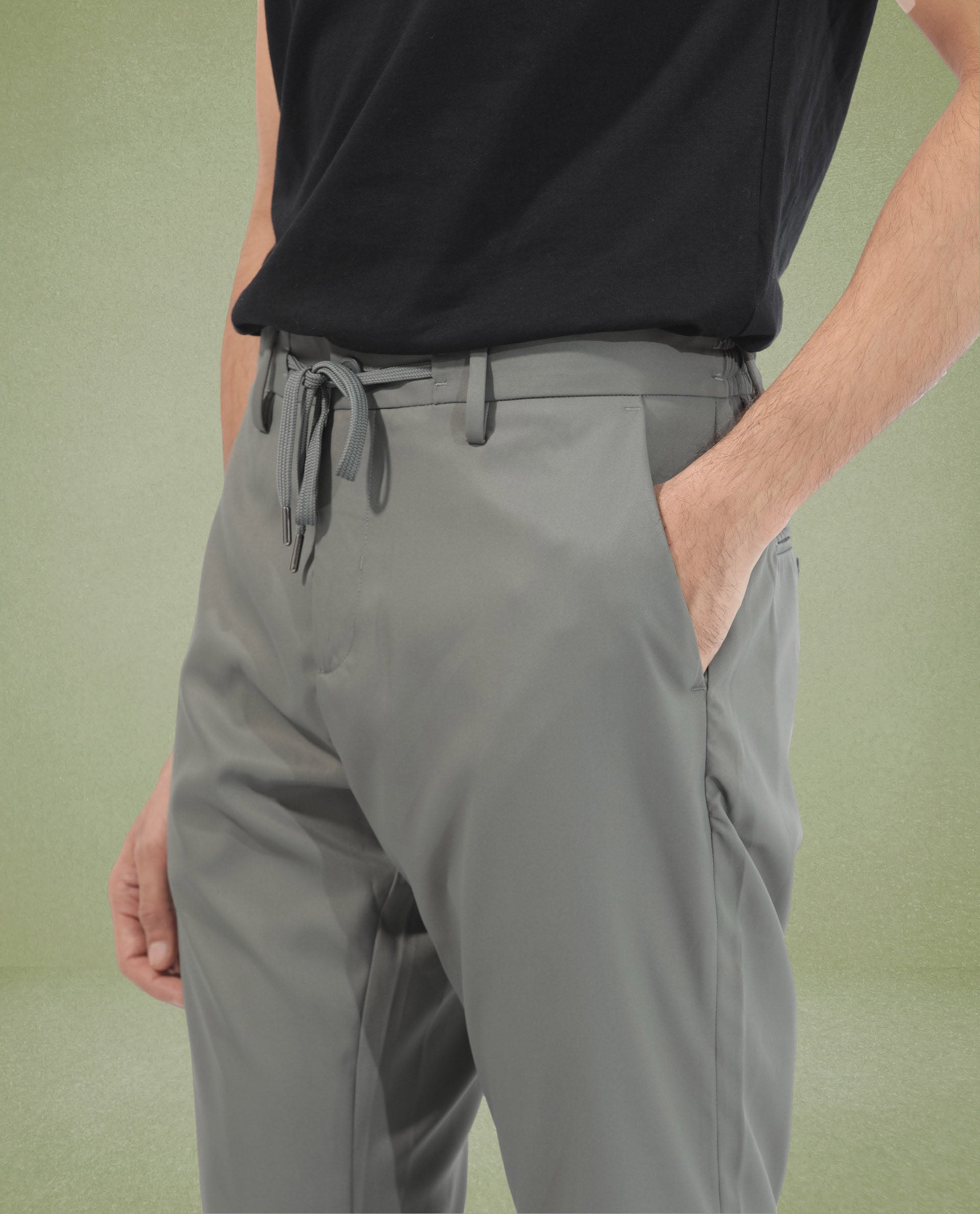 Rare Rabbit Men's Nimb Dusky Green Polyester Fabric Drawstring And Button Closure High Rise Regular Fit Solid Trousers