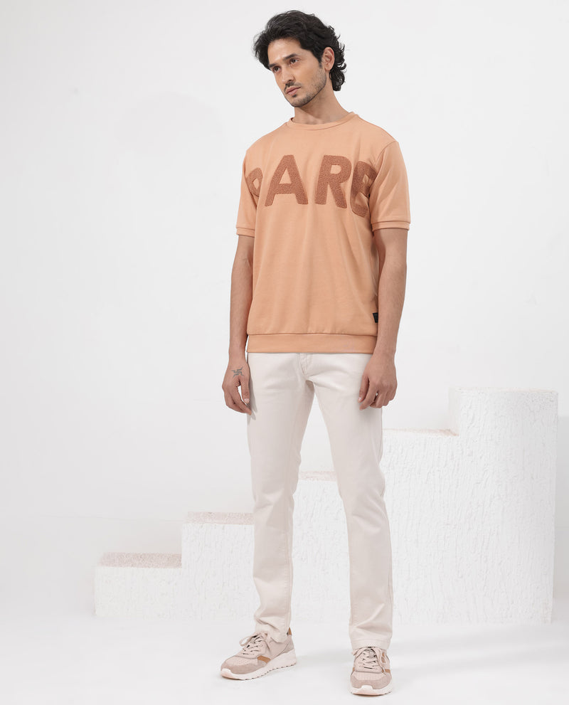 Rare Rabbit Mens Nor-2 Dusky Orange Loopback Terry Fabric Half Sleeves Graphic Print Oversized T-Shirt