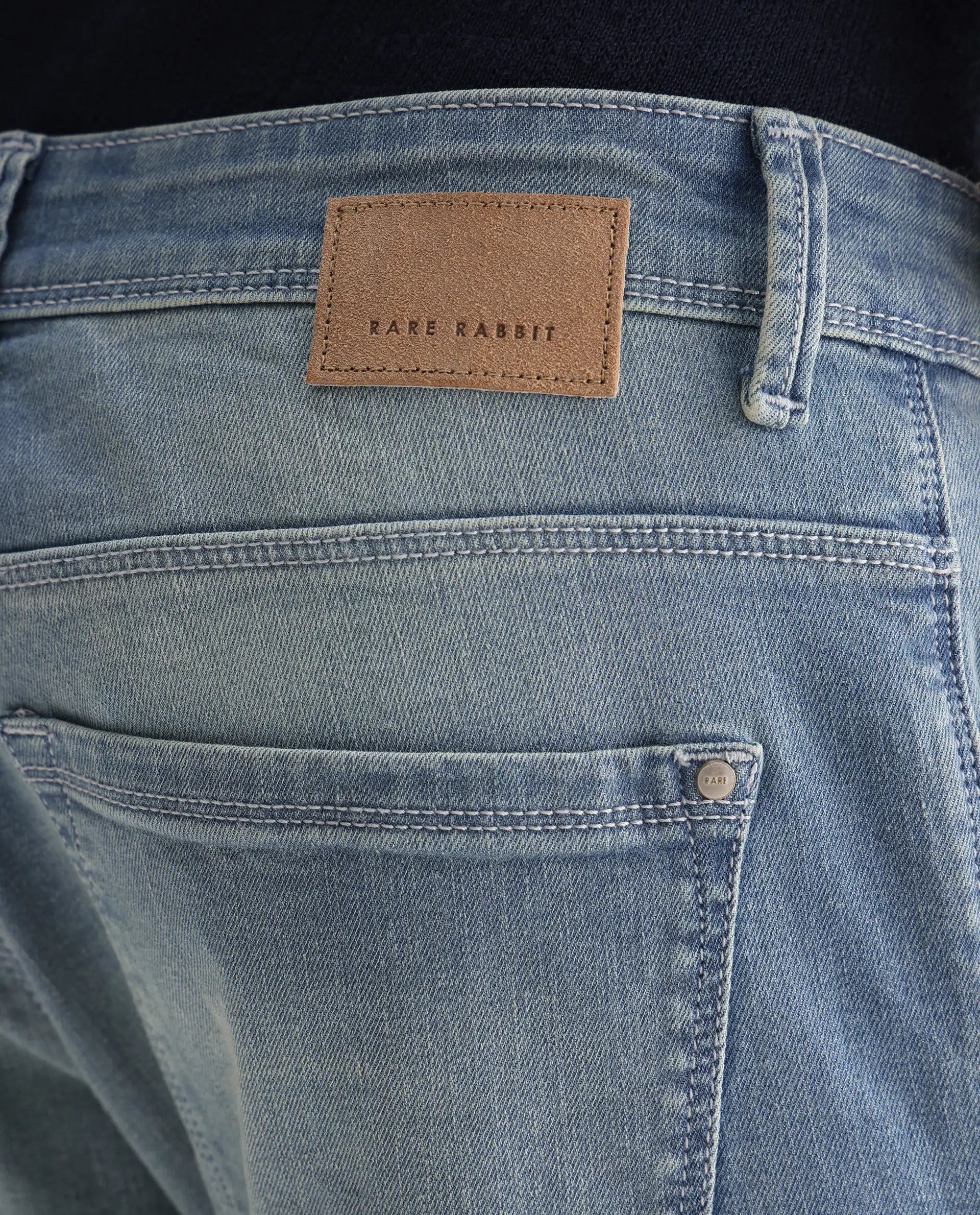 Rare Rabbit Men's Orsica Fluorescent Blue Cotton Plain Hawk Slim Fit Jeans