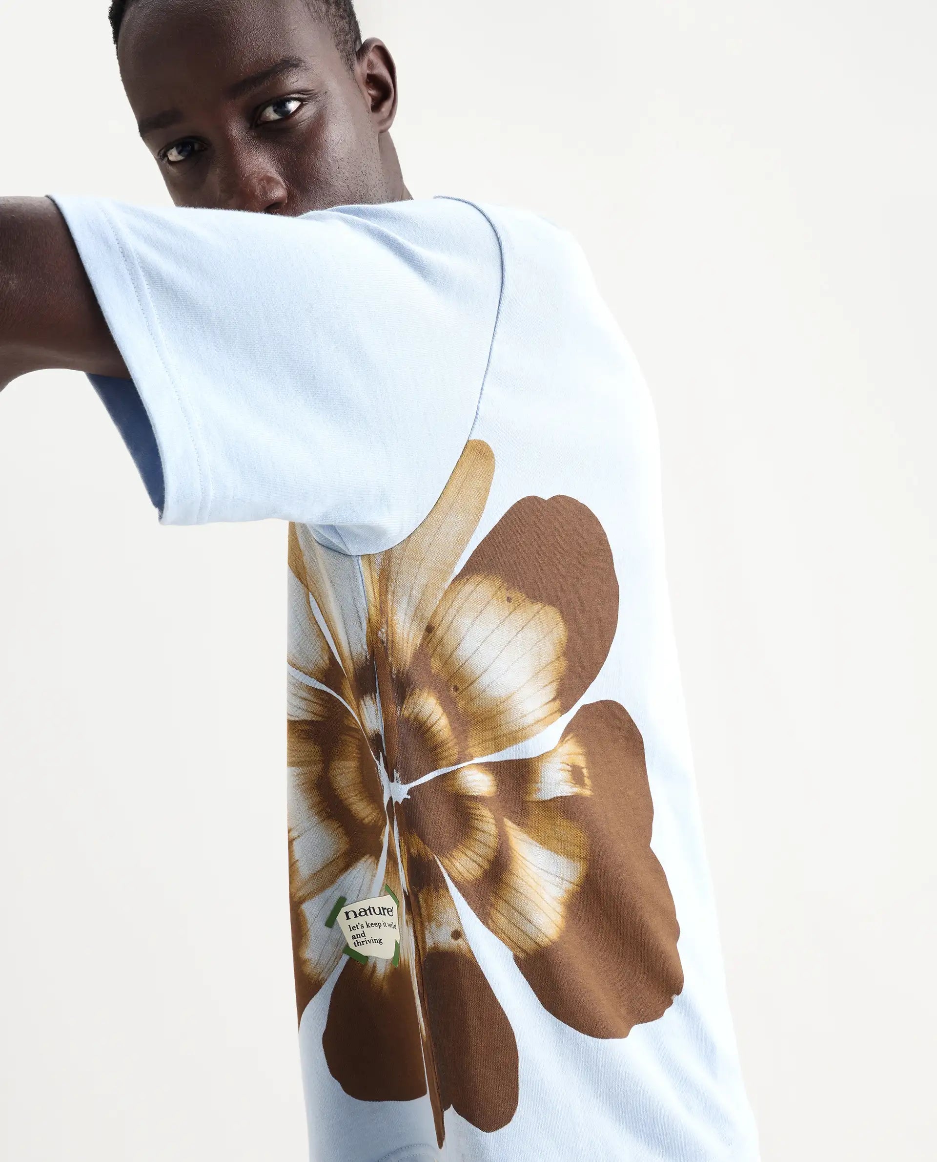 Rare Rabbit Men's Petas Light Blue Cotton Graphic Print Oversized Fit Half Sleeve Crew Neck T-Shirt