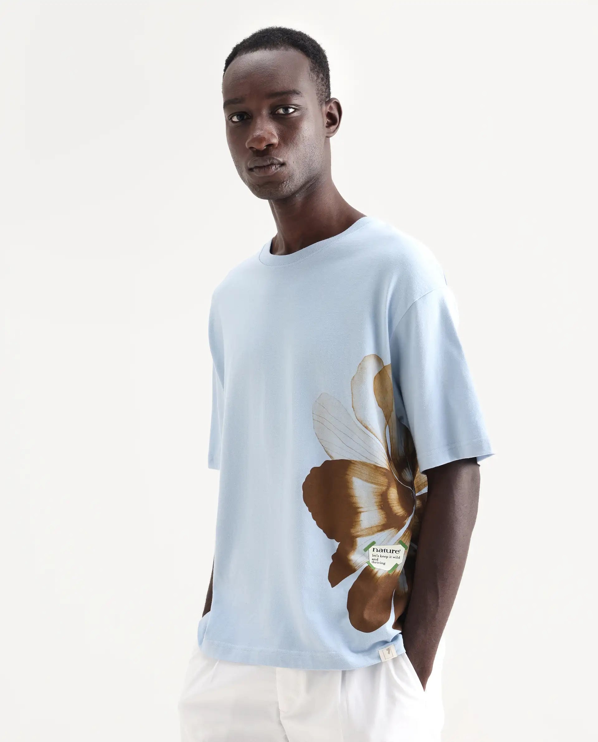 Rare Rabbit Men's Petas Light Blue Cotton Graphic Print Oversized Fit Half Sleeve Crew Neck T-Shirt