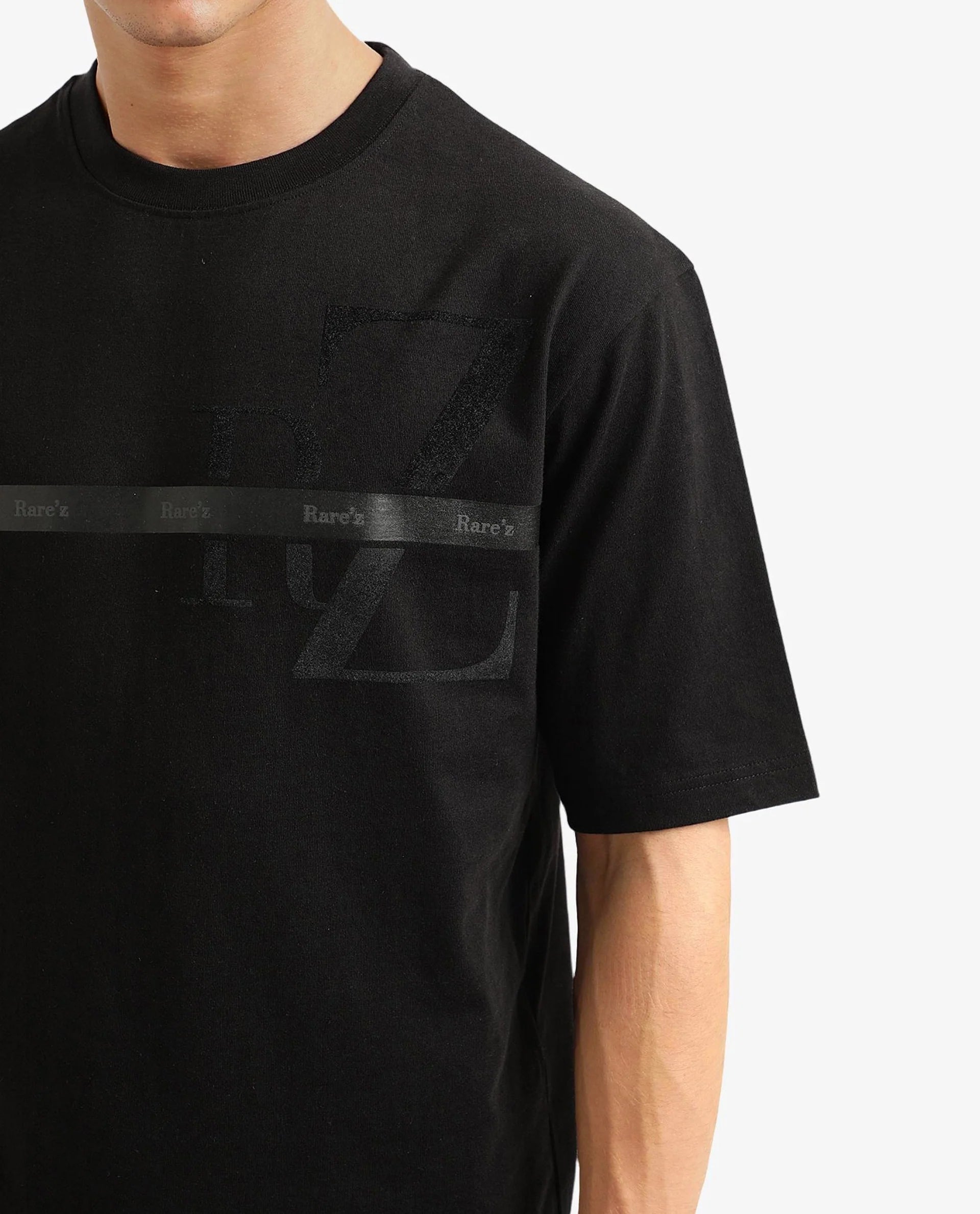 Rare Rabbit Men Reis Black Cotton Fabric Short Sleeve Crew Neck Oversized Fit Graphic Flock Print T-Shirt