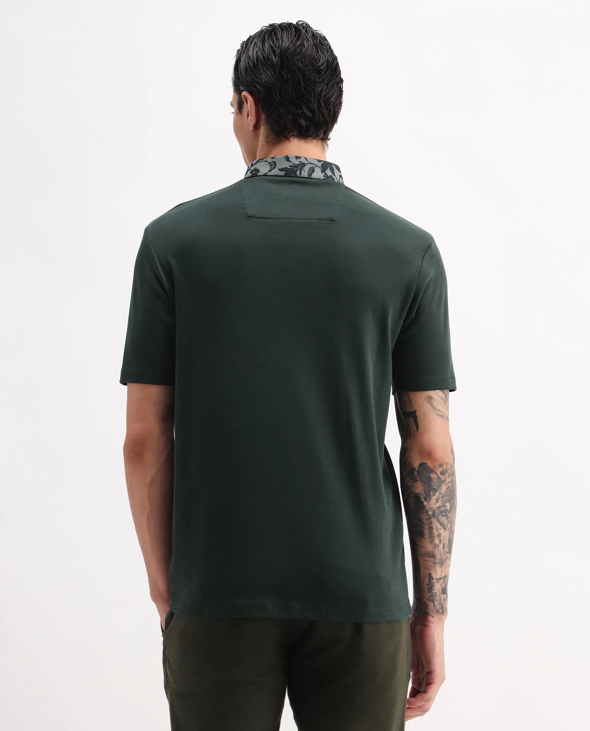 Rare Rabbit Men's Ringer-A25 Dark Green Cotton Plain Regular Fit Half Sleeve Polo