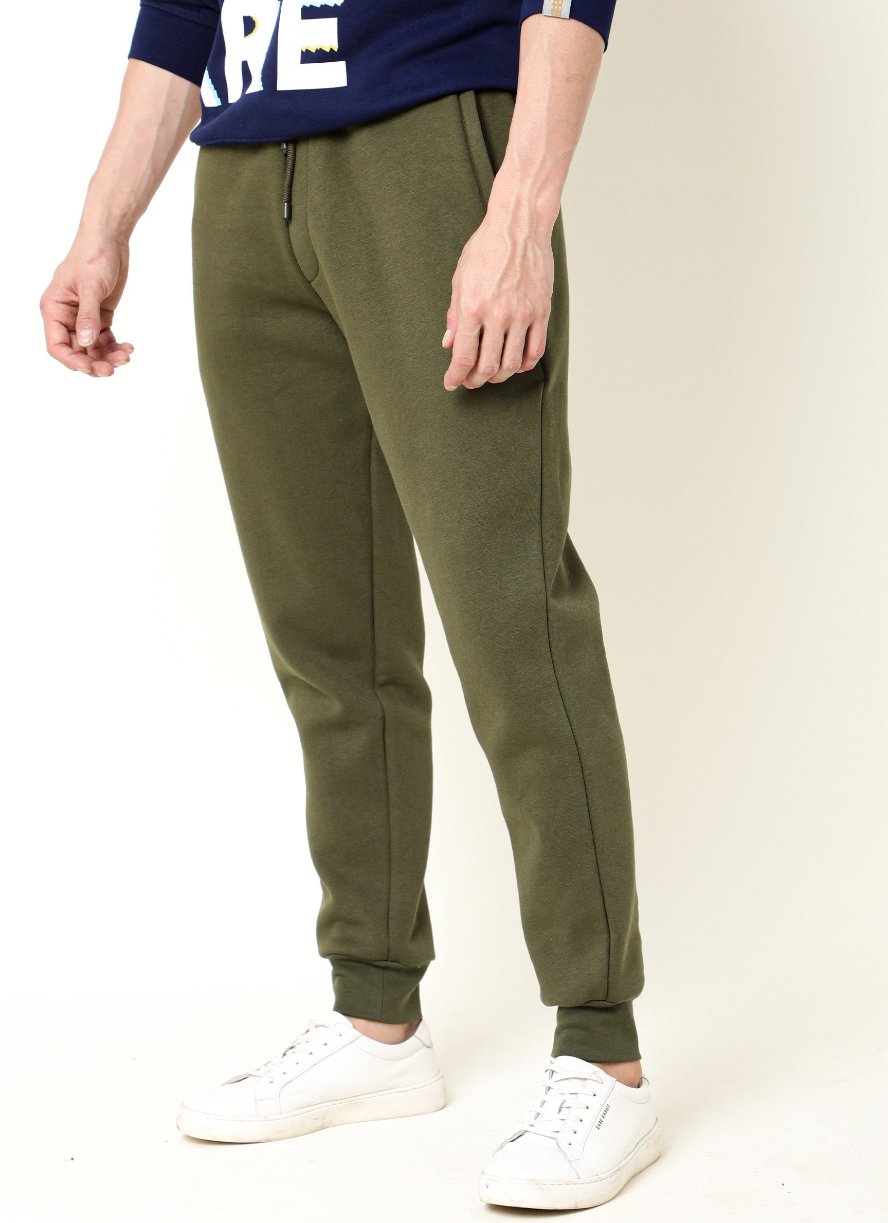 Rare Rabbit Men's Titan Light Green Cotton Polyester Fabric Relaxed Fit Mid Rise Knitted Track Pant