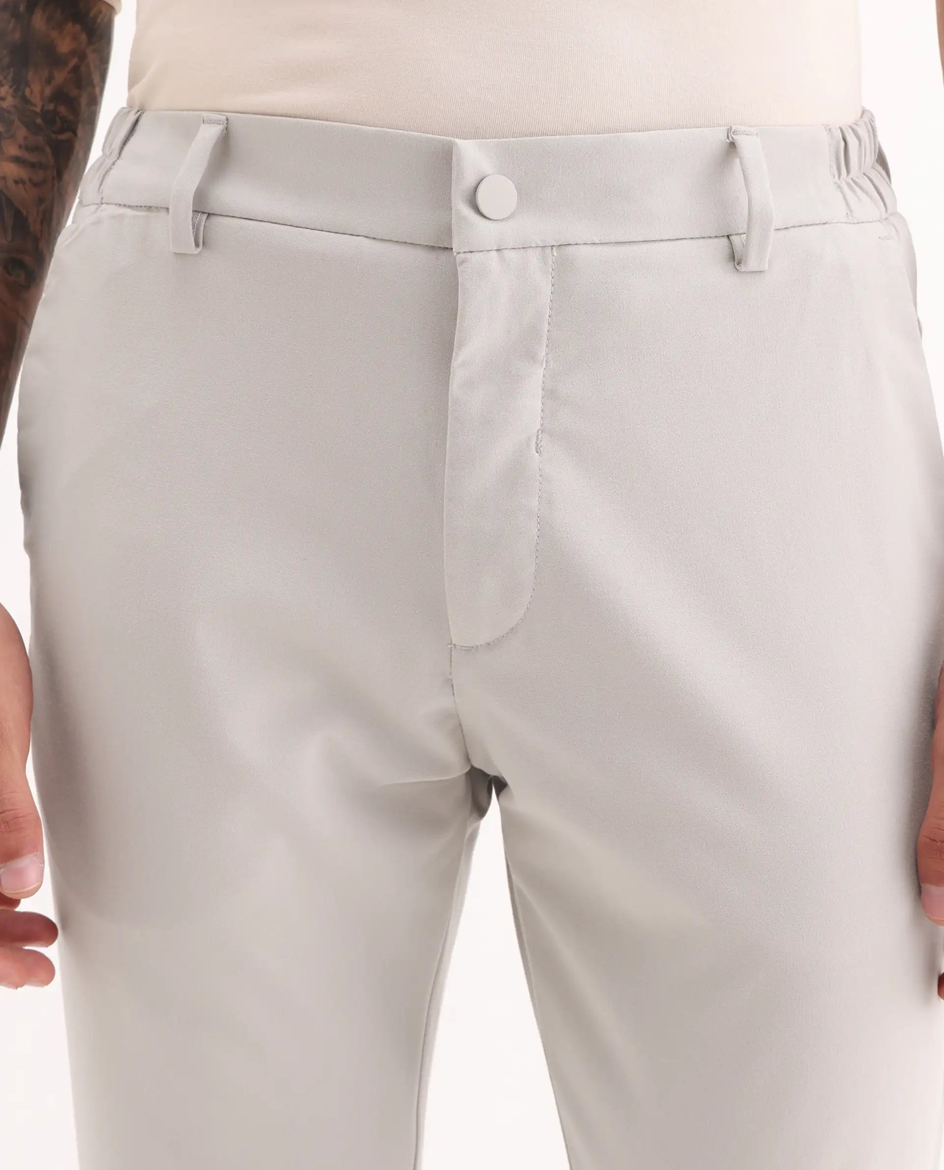 Rare Rabbit Men's Travel-11 Light Beige Polyester Blend Plain Regular Fit Trouser