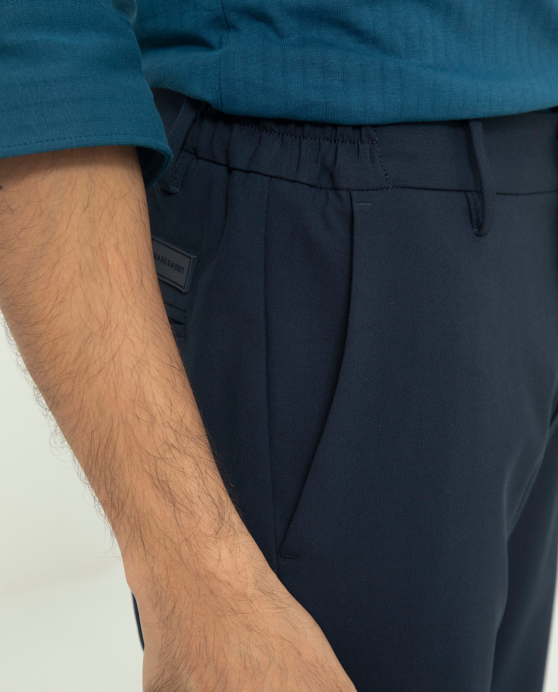 Rare Rabbit Men's Traveller Navy Solid Mid-Rise Regular Fit Trouser