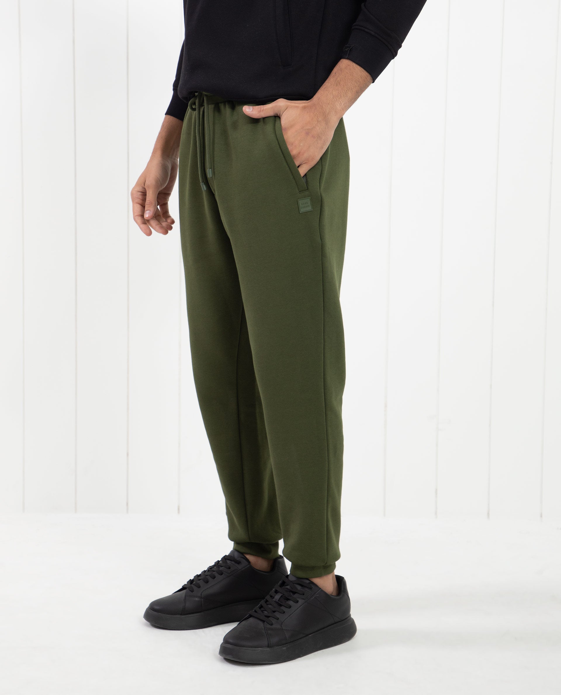 Rare Rabbit Mens Tyrone Olive Cotton Polyester Fabric Drawstring Closure Regular Fit Mid Rise Trackpant