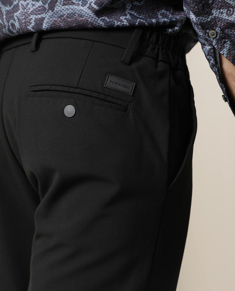 Rare Rabbit Men's Travel-22 Black Solid Button & Zip Closure Slim Fit Trousers