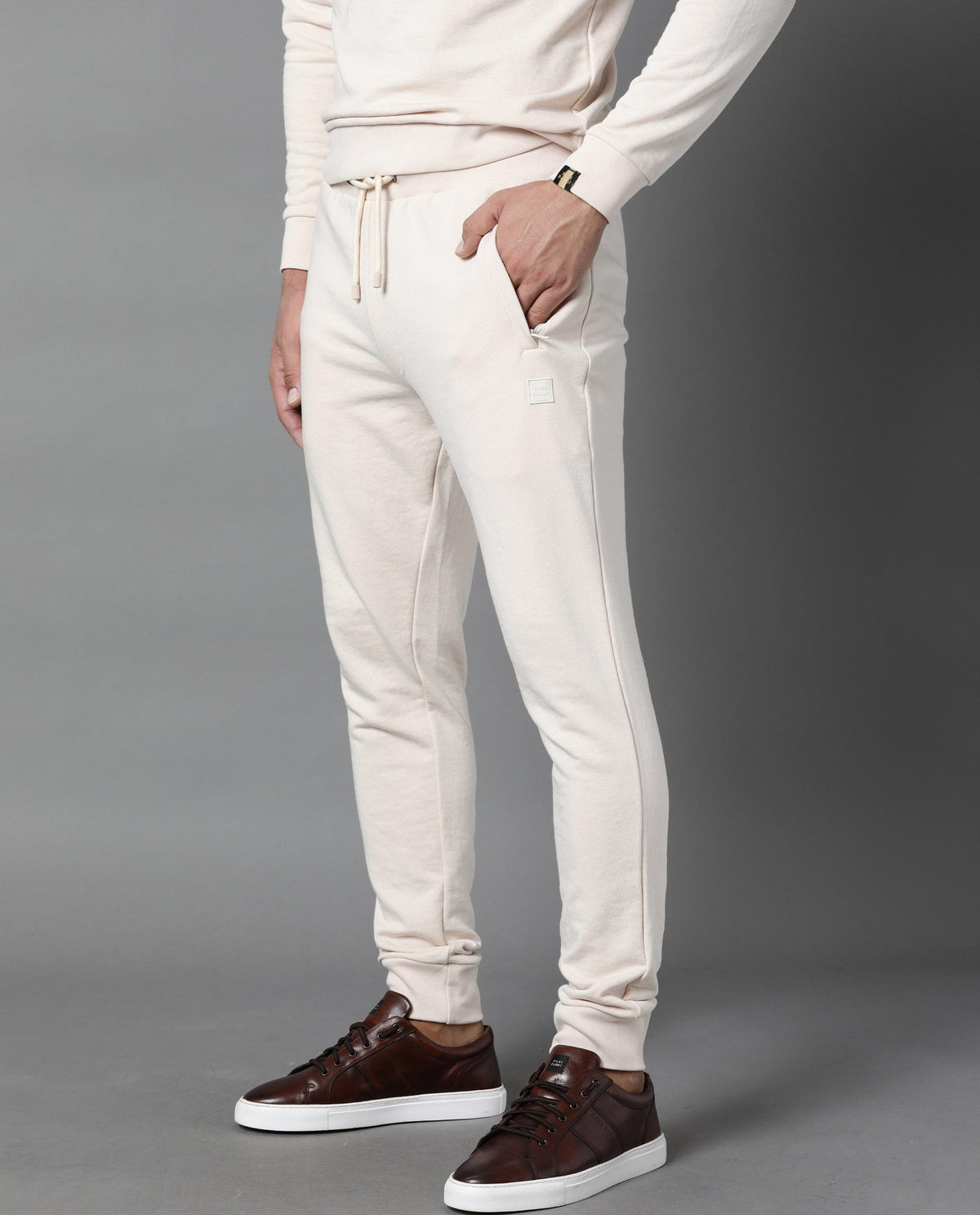RARE RABBIT MEN'S ARVON BEIGE TRACK PANT COTTON POLY FABRIC SOLID SLIM FIT MID RISE