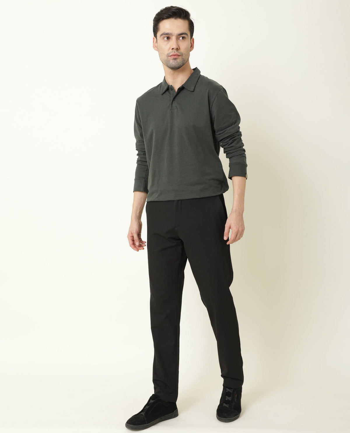 Rare Rabbit Men's Travel-2 Black Solid Mid-Rise Slim Fit Stretch Trousers
