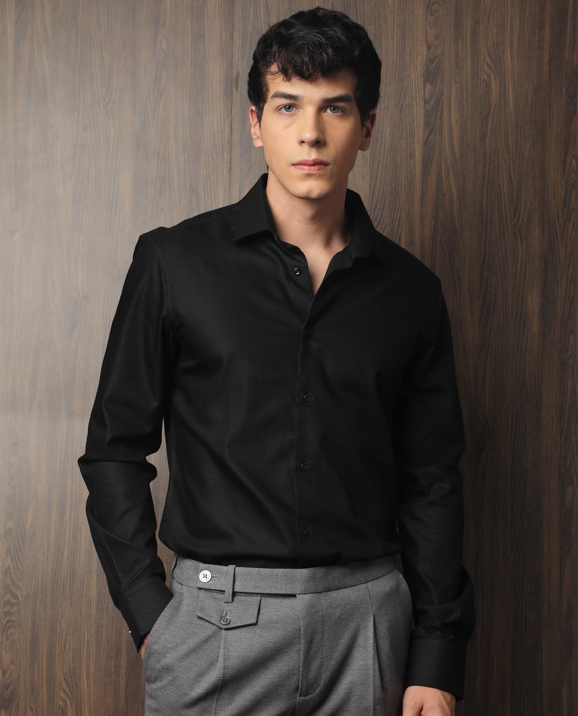 gray color pants and black shirt