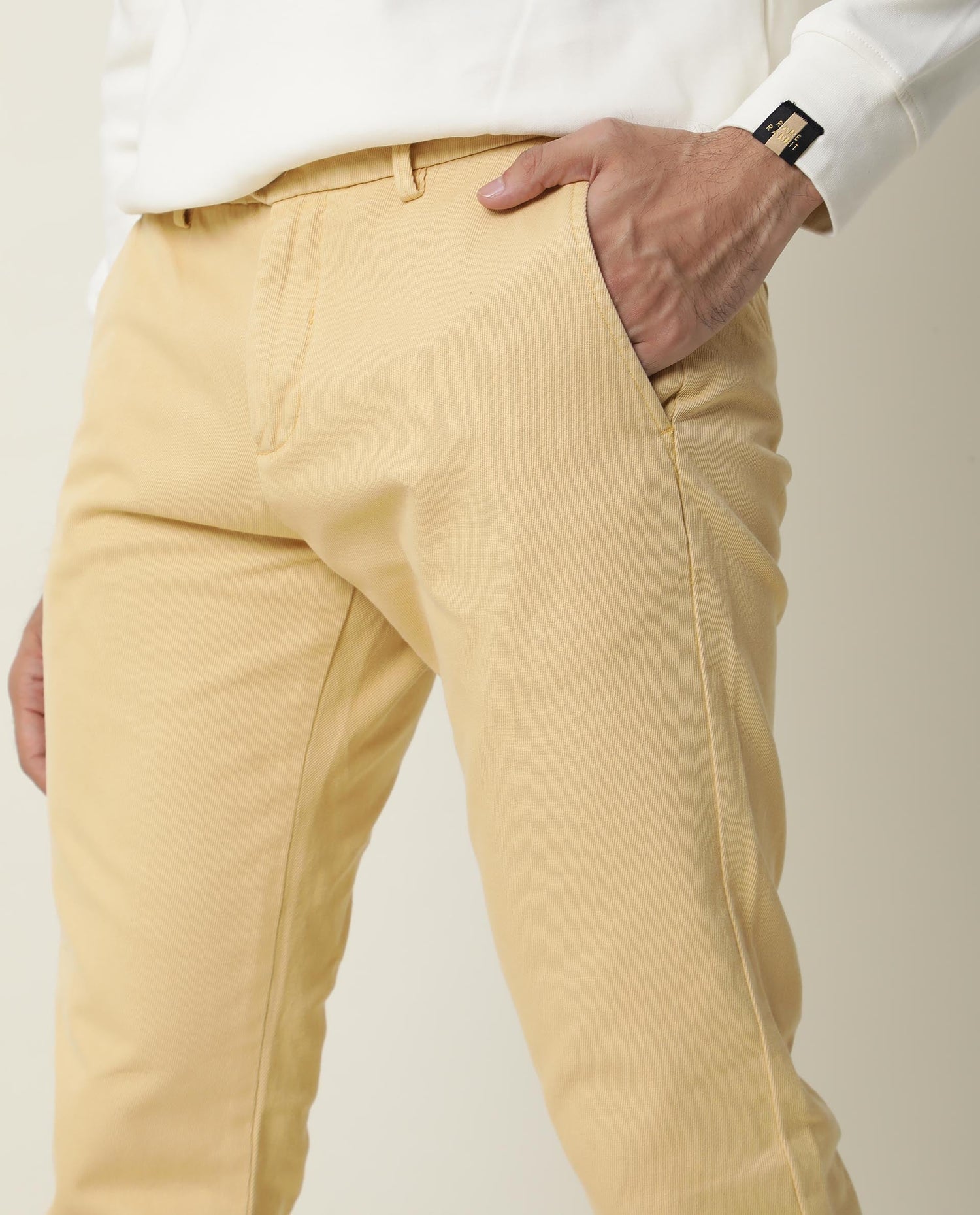 Rare Rabbit Men's Scotch Yellow Solid Mid-Rise Regular Fit Trouser