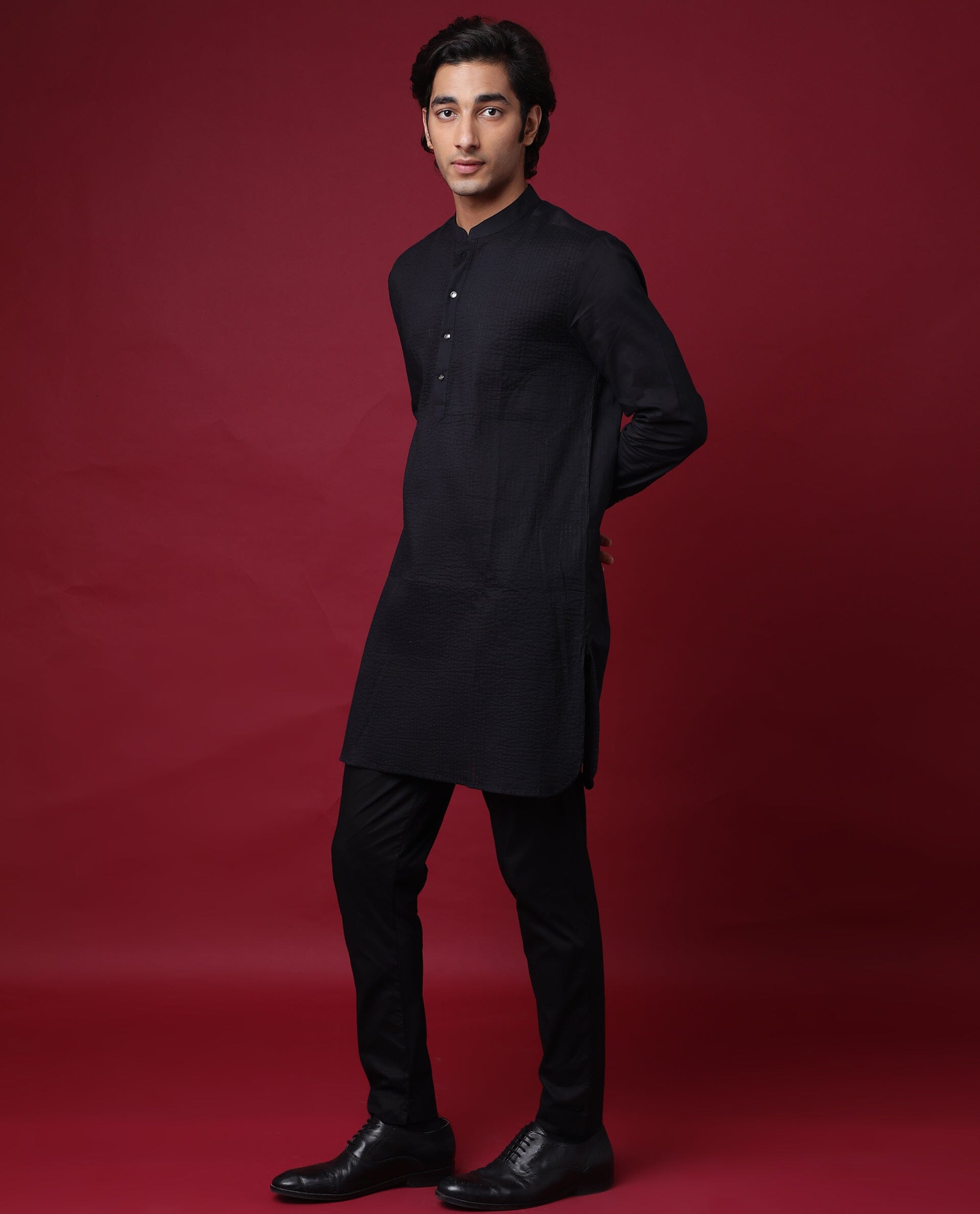 Jet Black Indo Western Slim Achkan Suit paired with White Narrow Pants   archerslounge
