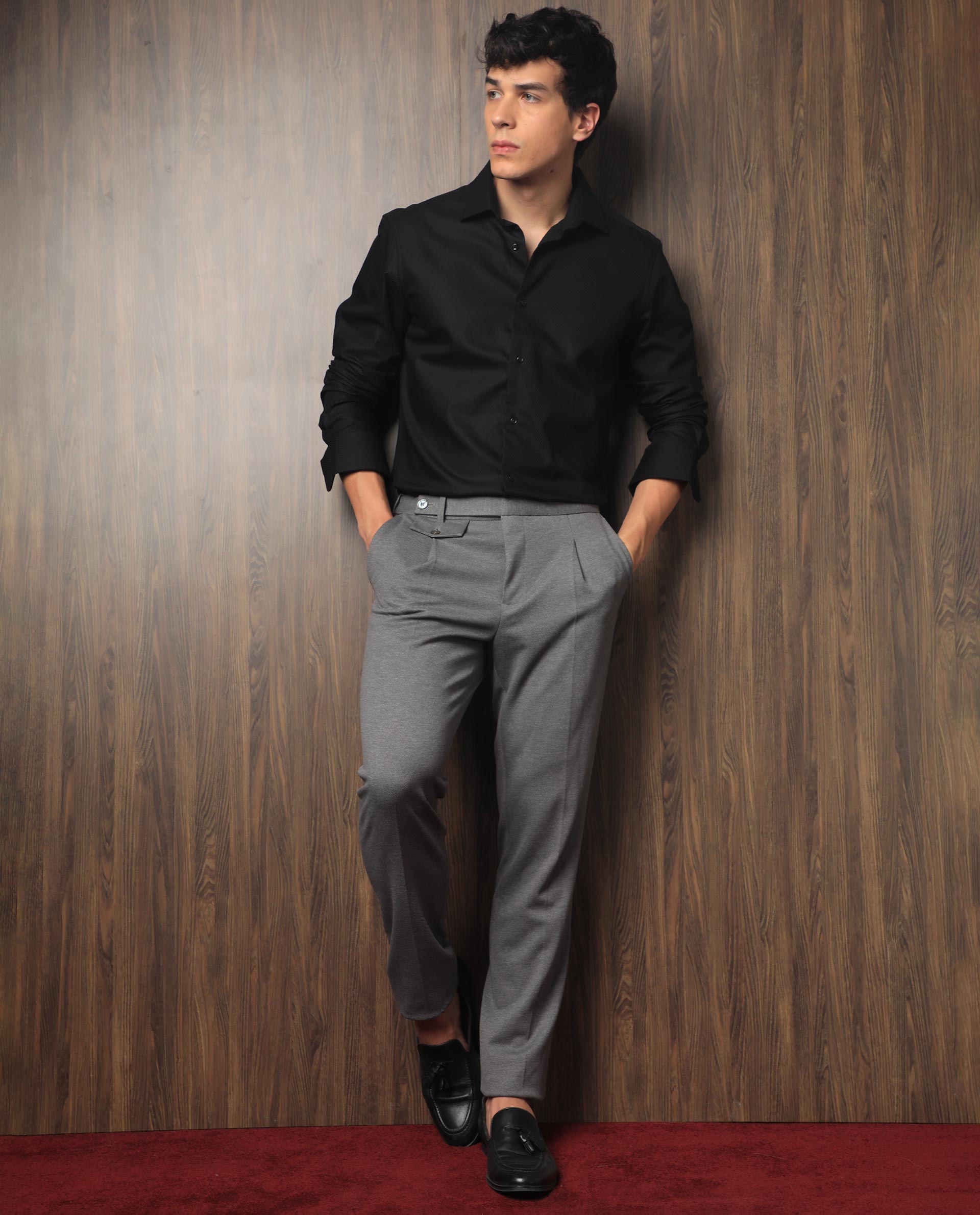 Black shirt and cheap dark grey pants