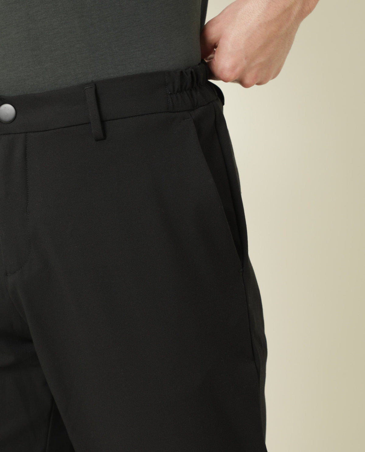 Rare Rabbit Men's Travel-2 Black Solid Mid-Rise Slim Fit Stretch Trousers