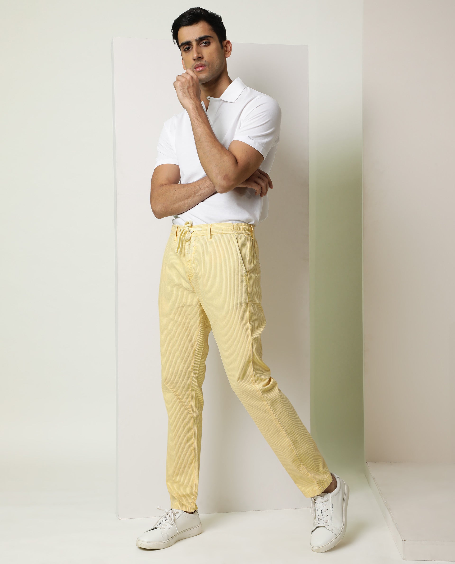 Buy GANNI Highrise Wideleg Jeans - Pastel Yellow At 54% Off | Editorialist