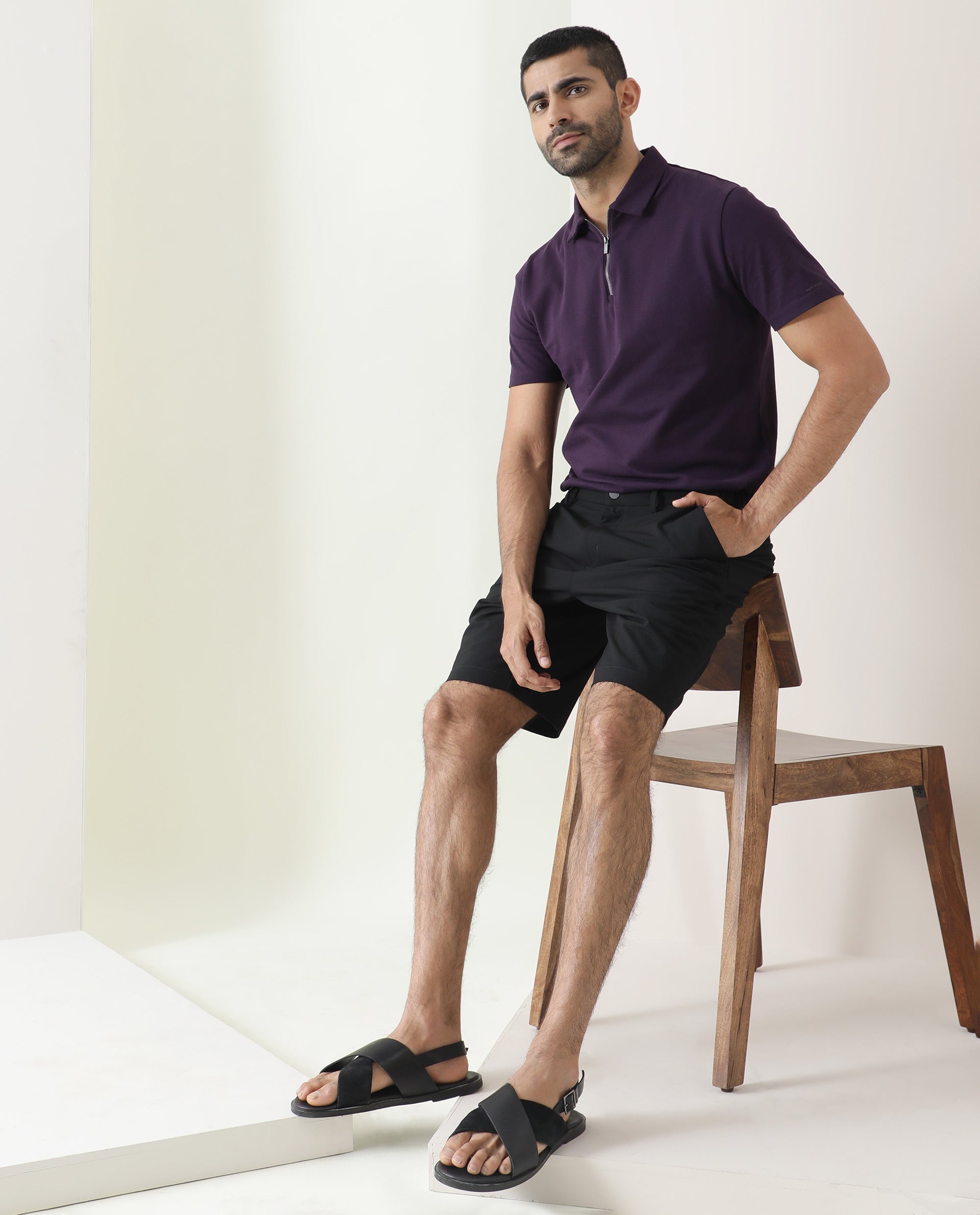 Rare Rabbit Mens Trip Black Mid Rise Regular Fit Solid Shorts