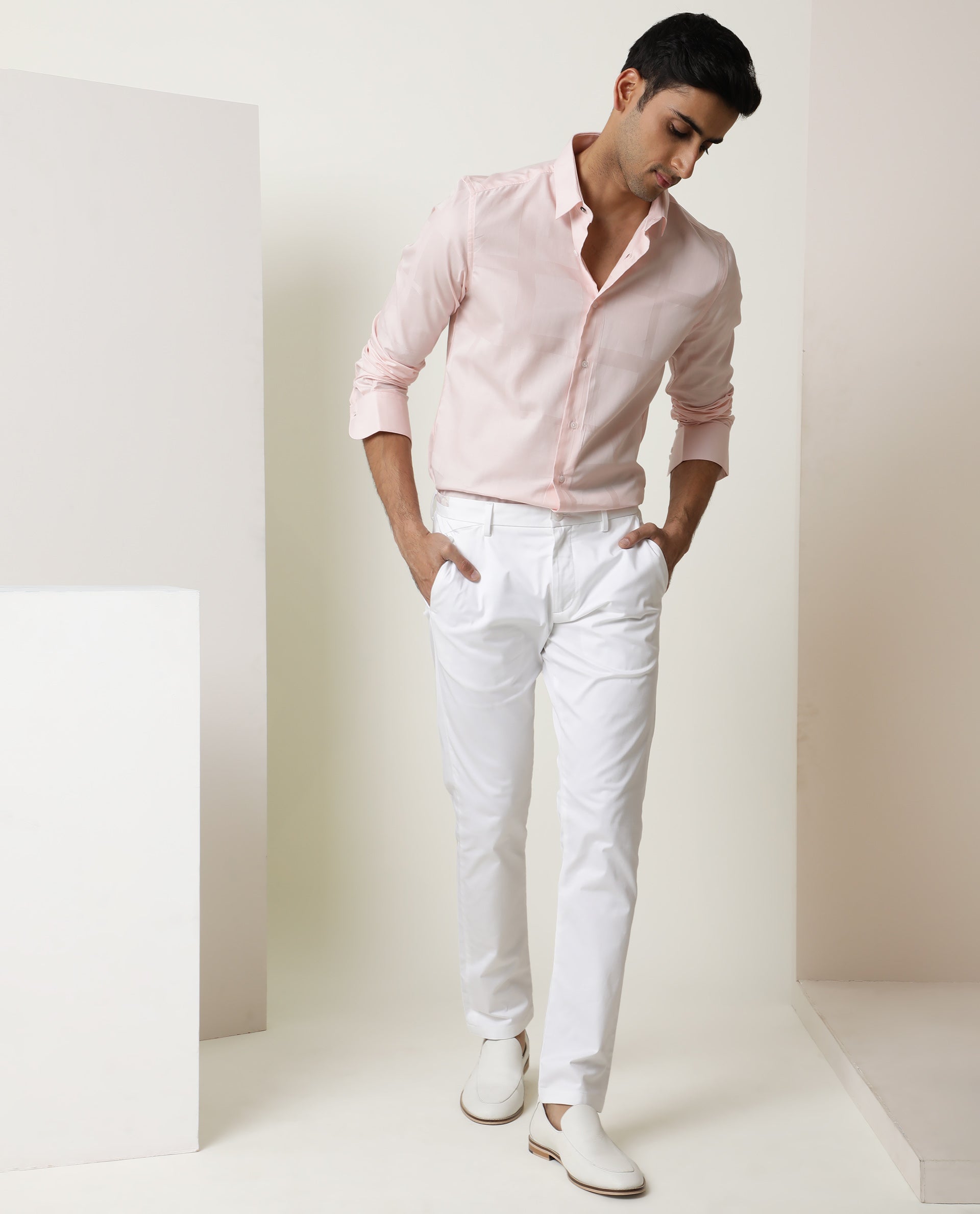 Rare Rabbit Men's Daron White Solid Mid-Rise Regular Fit Stretch Trousers