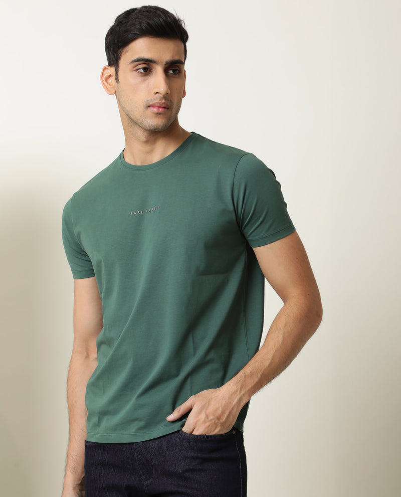 Rare Rabbit Men's Rabbi Pastel Green Cotton Lycra Fabric Crew Neck Half Sleeves Regular Fit Rare Branding Solid T-Shirt