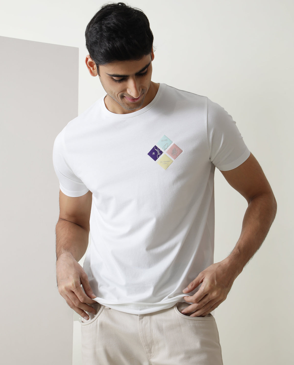 Rare Rabbit Men's Badget White Cotton Lycra Fabric Crew Neck Half Sleeves Regular Fit Graphic Print Branding T-Shirt