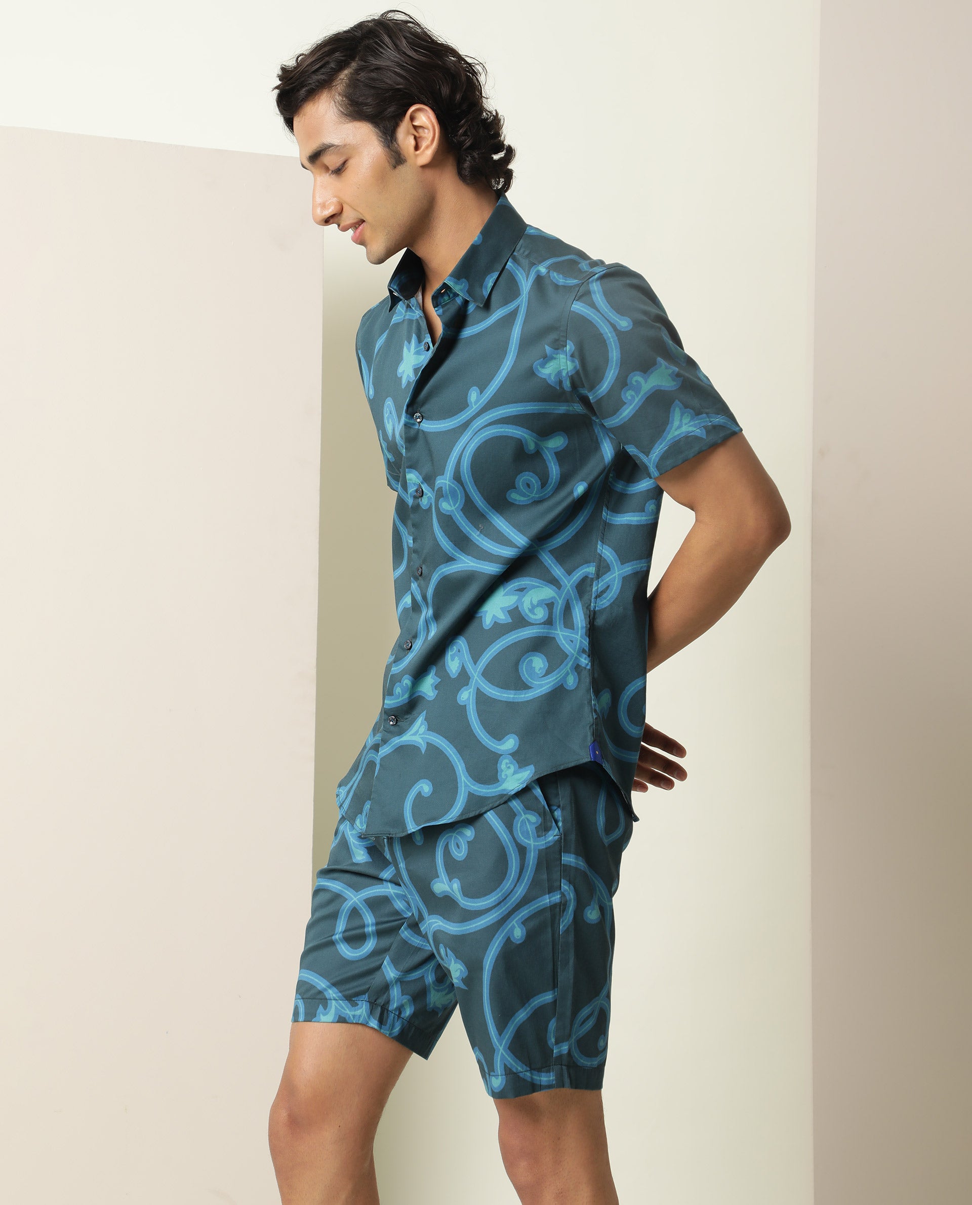 Rare Rabbit Mens Monlet Petrol Cotton Fabric Button & Zip Closure Regular Fit Mid Rise Abstract Print Shorts