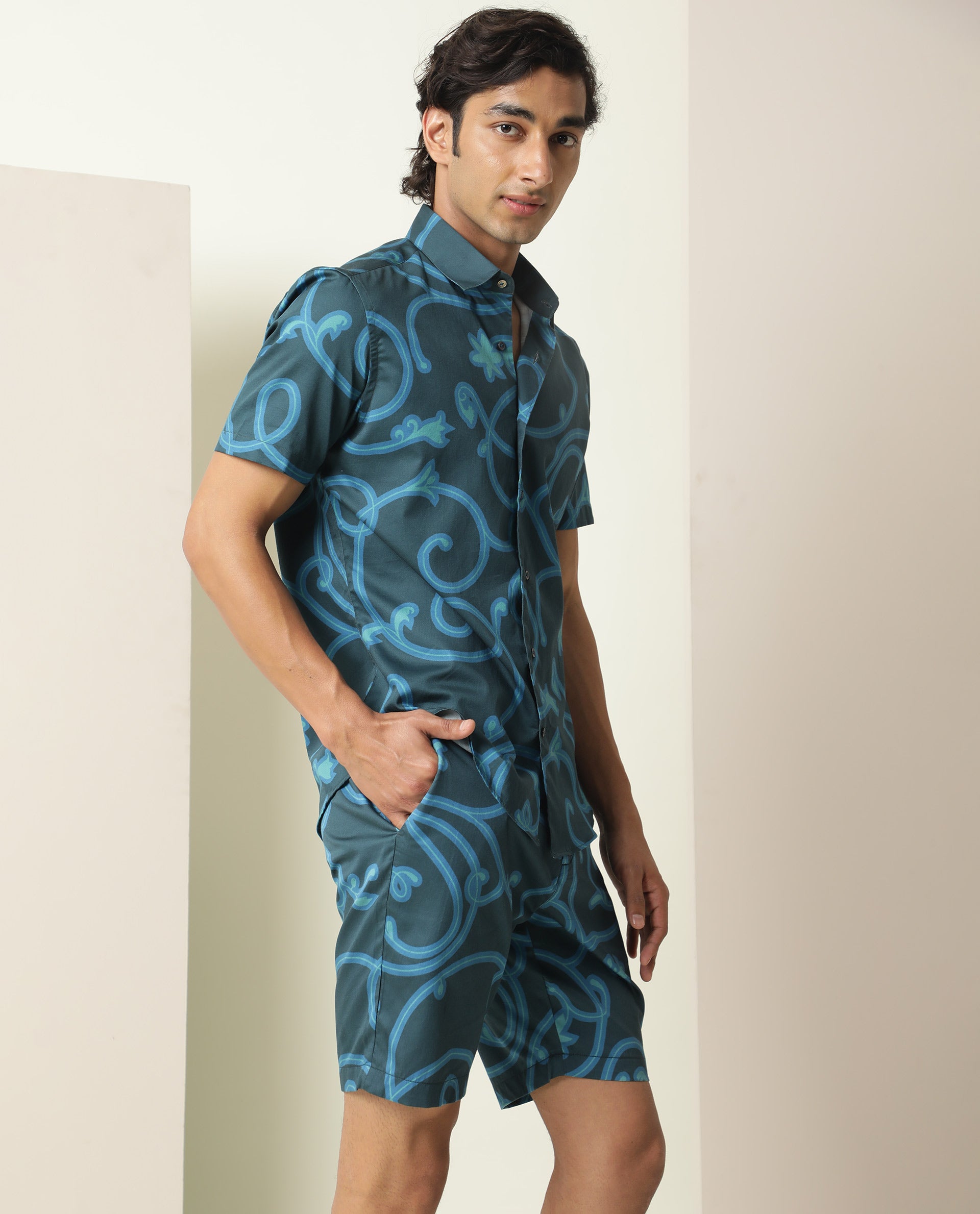 Rare Rabbit Mens Monlet Petrol Cotton Fabric Button & Zip Closure Regular Fit Mid Rise Abstract Print Shorts